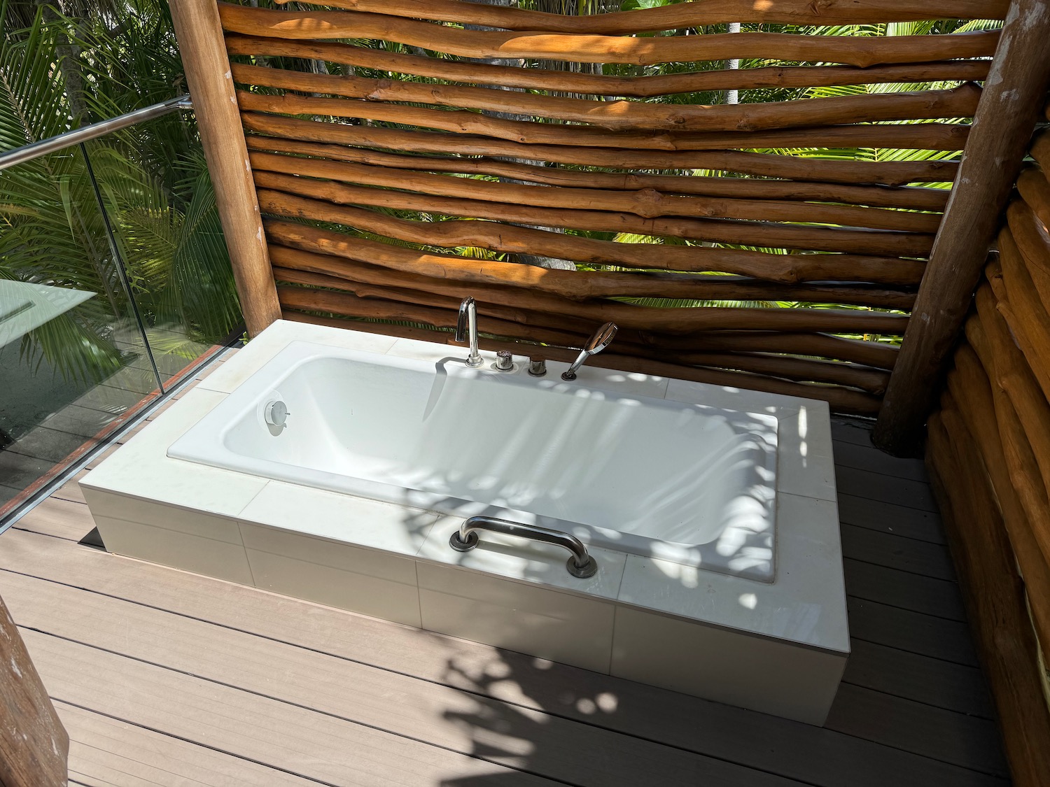 a bathtub on a deck