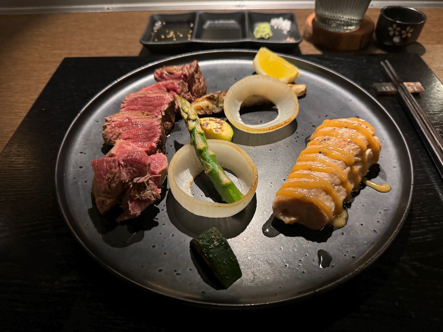 a plate of meat and vegetables