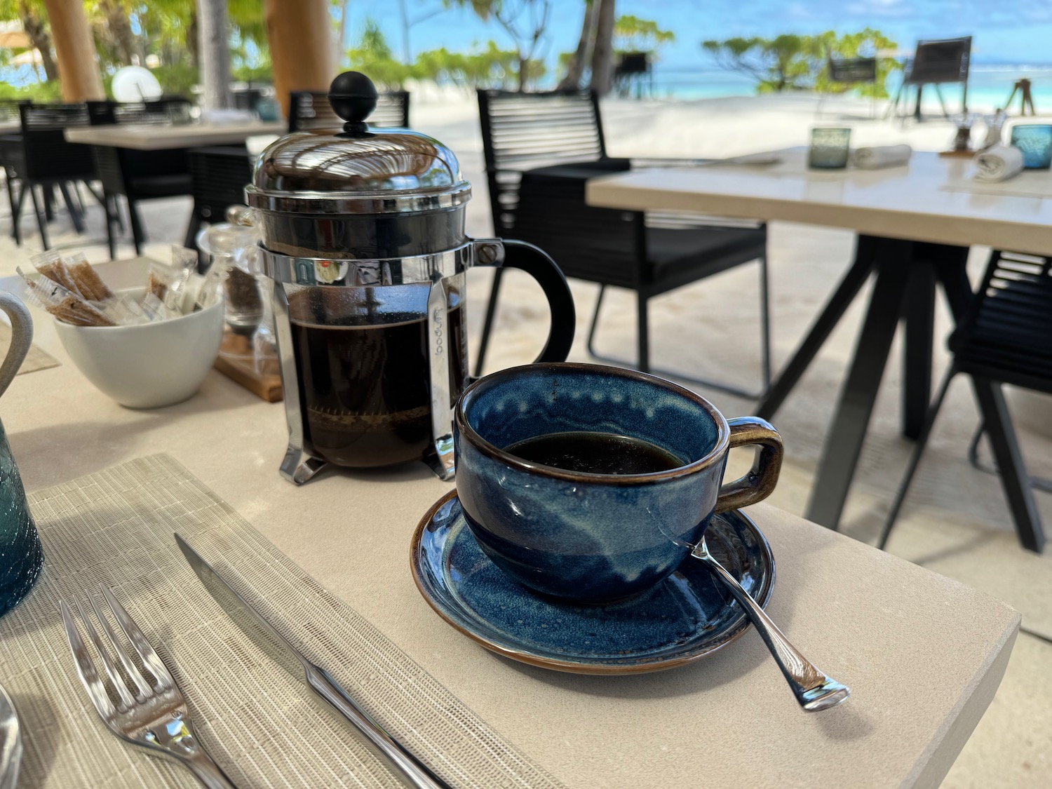 a coffee cup and saucer on a table