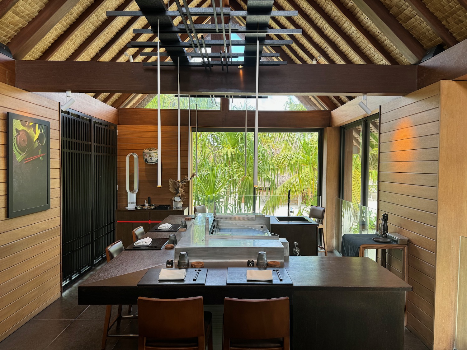 a large kitchen with a large table and chairs