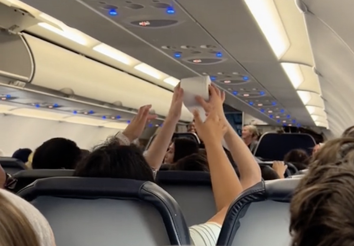 a group of people in an airplane