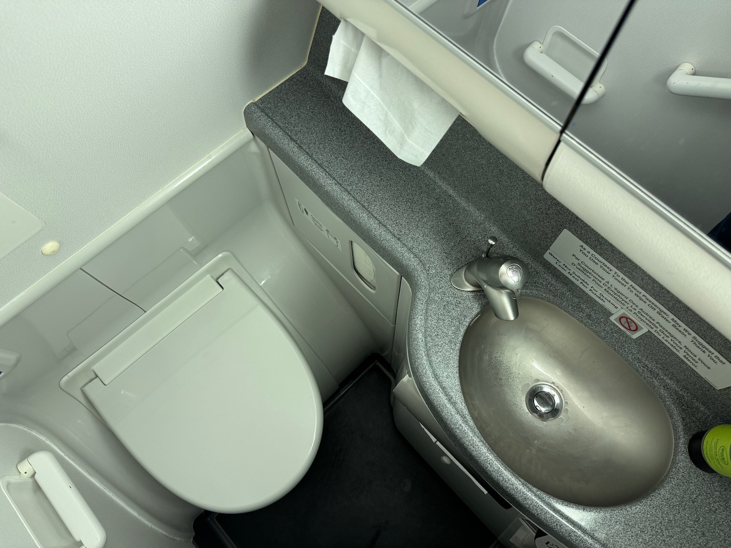 a sink and toilet in a bathroom