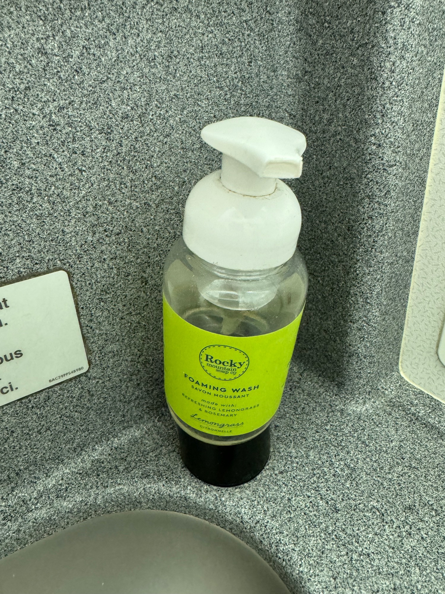 a soap dispenser on a counter