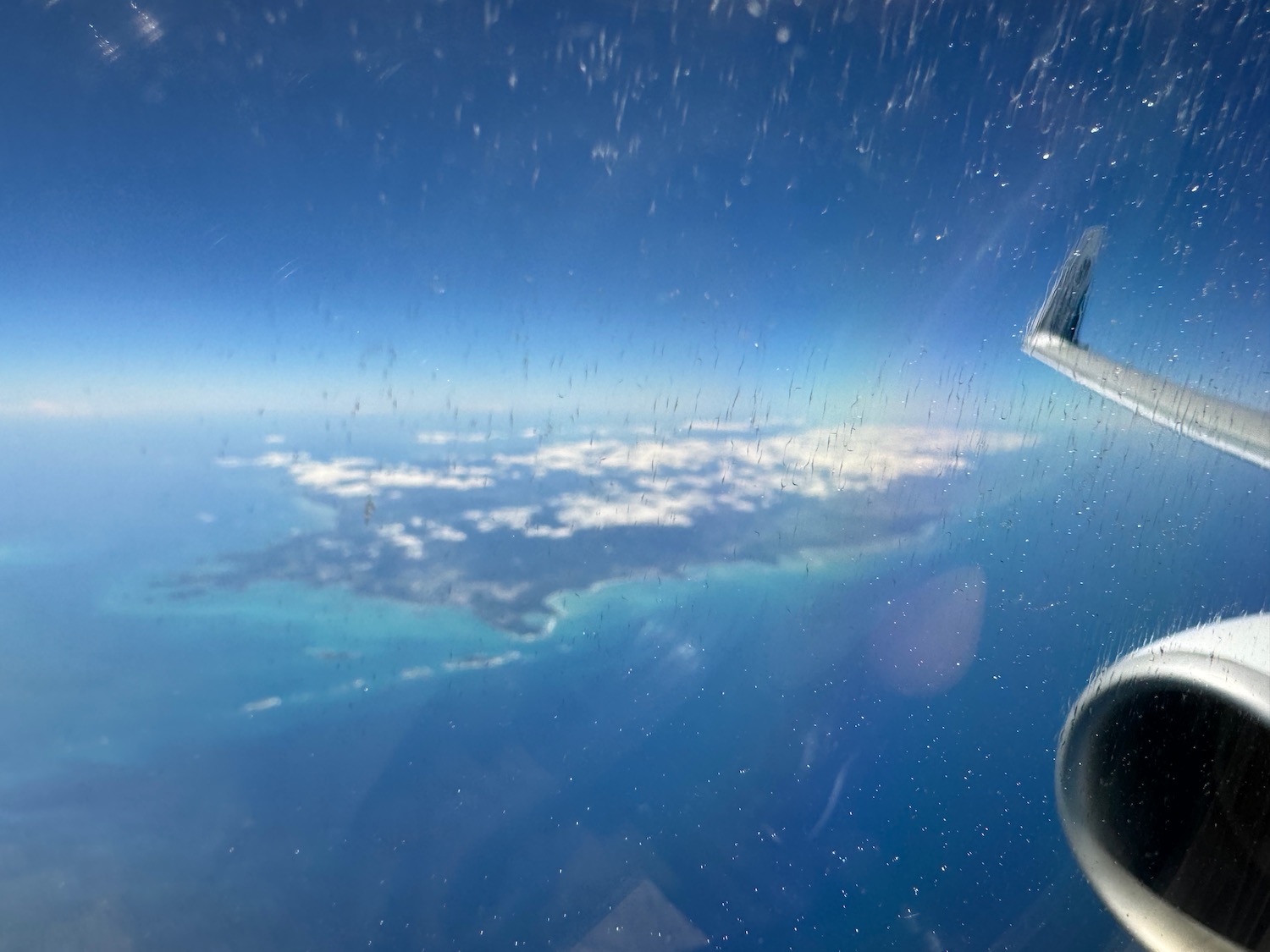 a view of the ocean from an airplane window