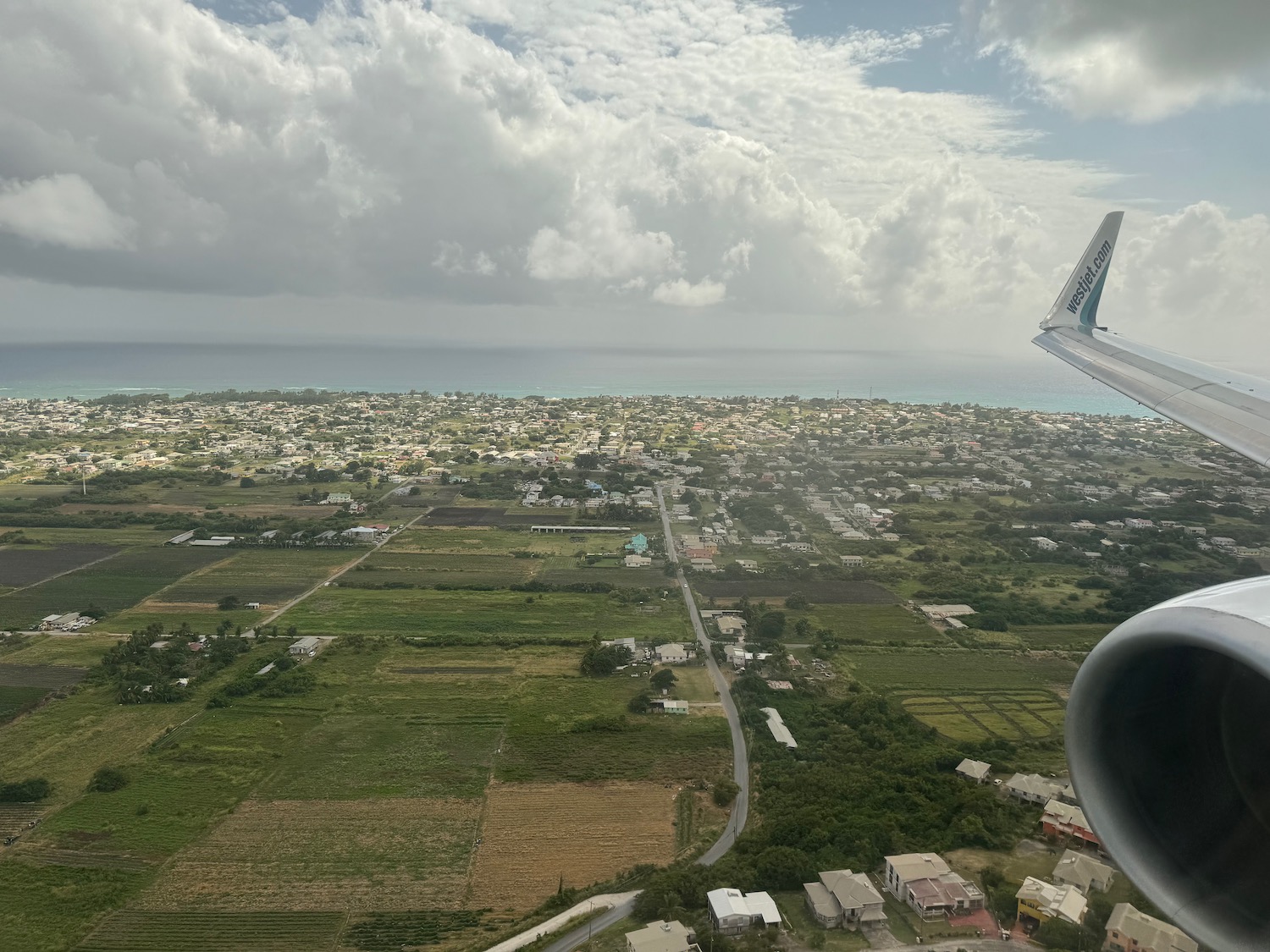 an airplane flying over a city