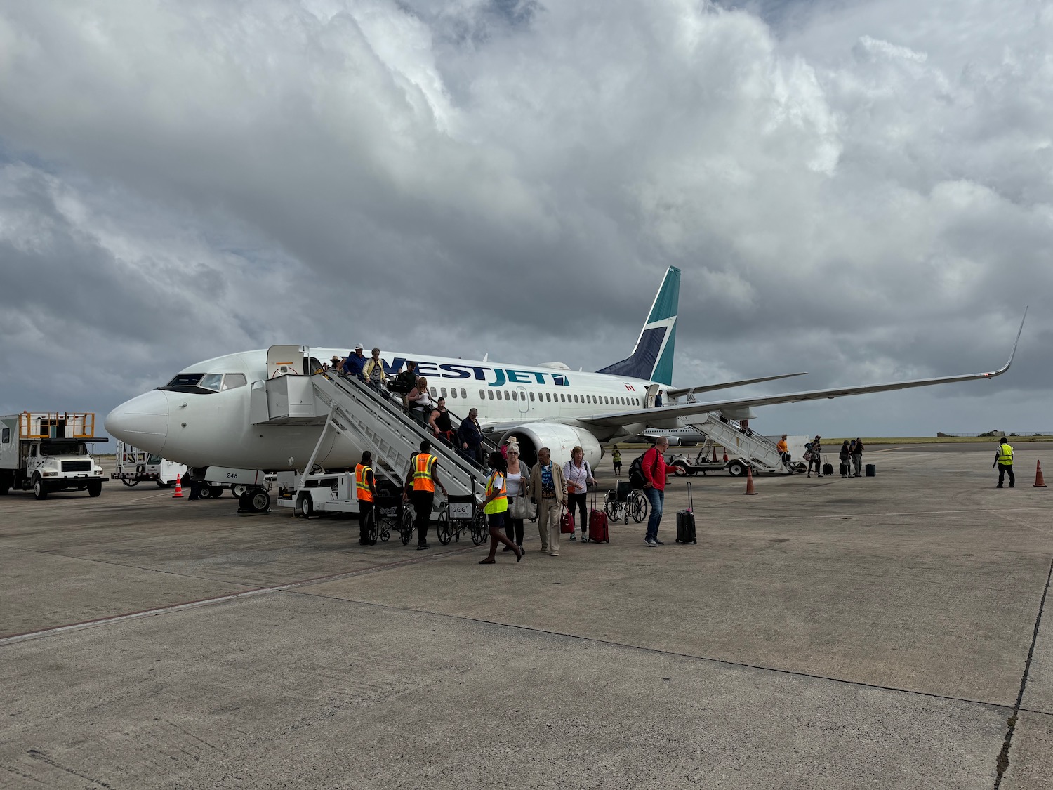 a group of people boarding an airplane