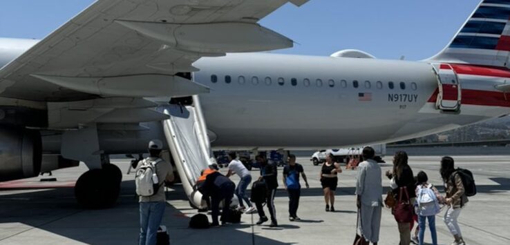 Passengers Defy Flight Attendants