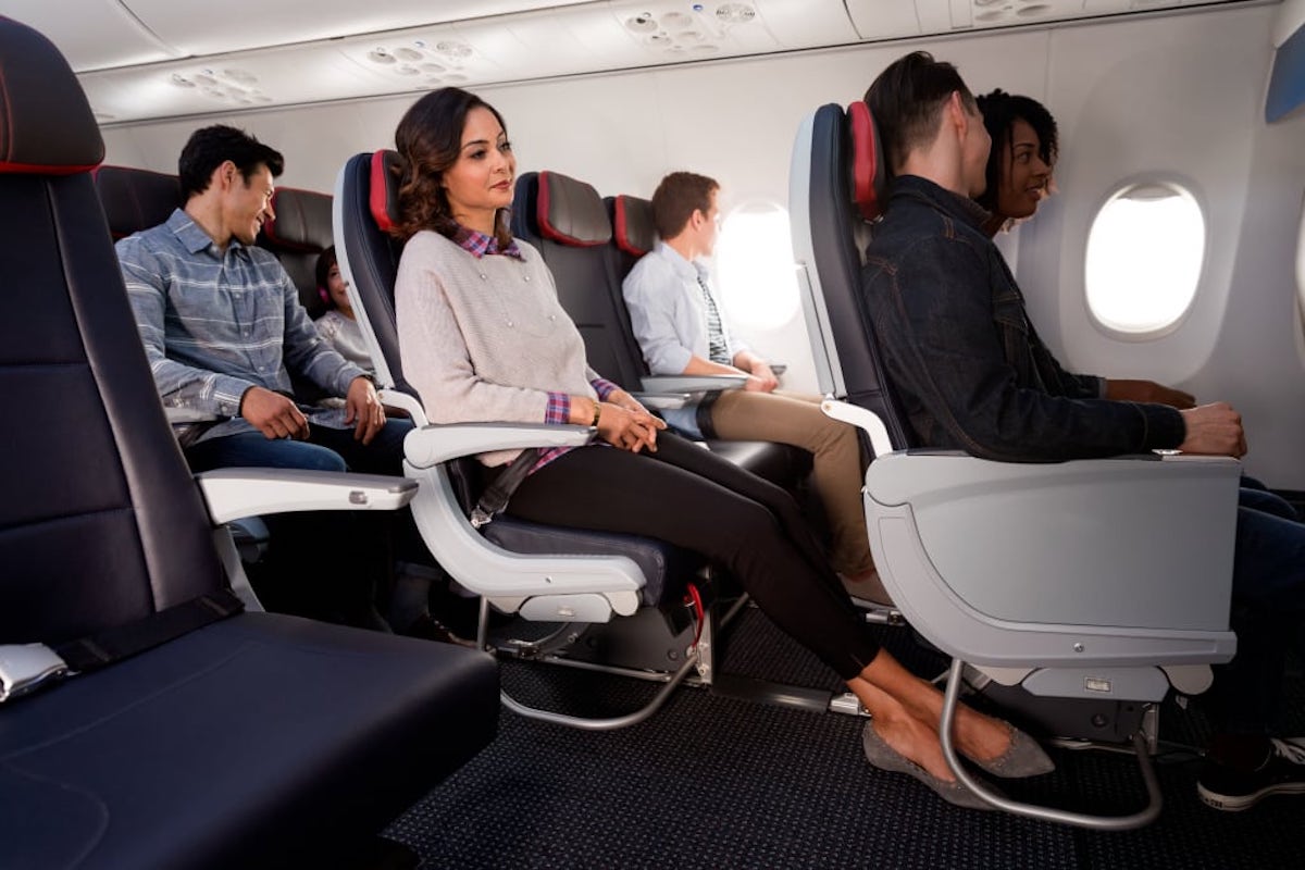 a woman sitting in a plane