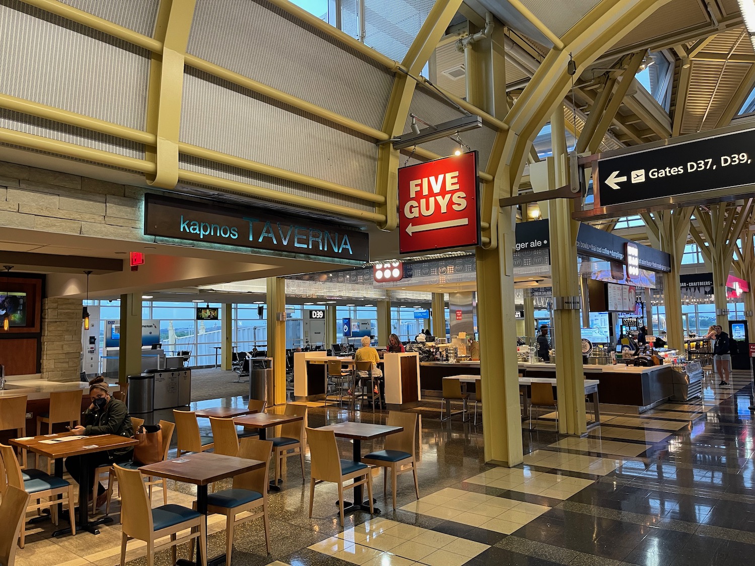 a restaurant with tables and chairs