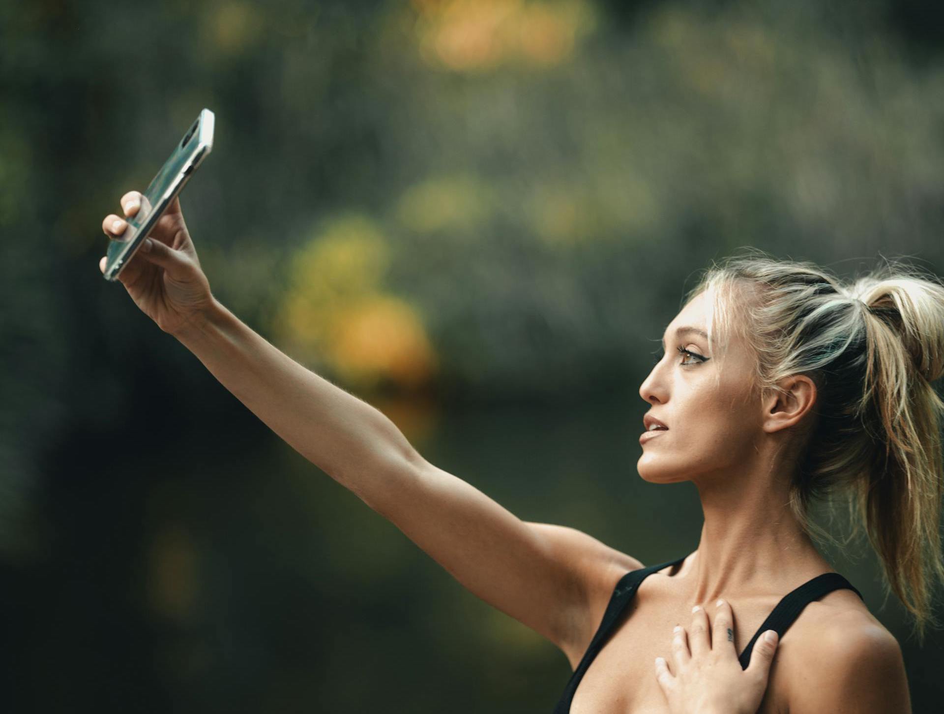 a woman taking a selfie