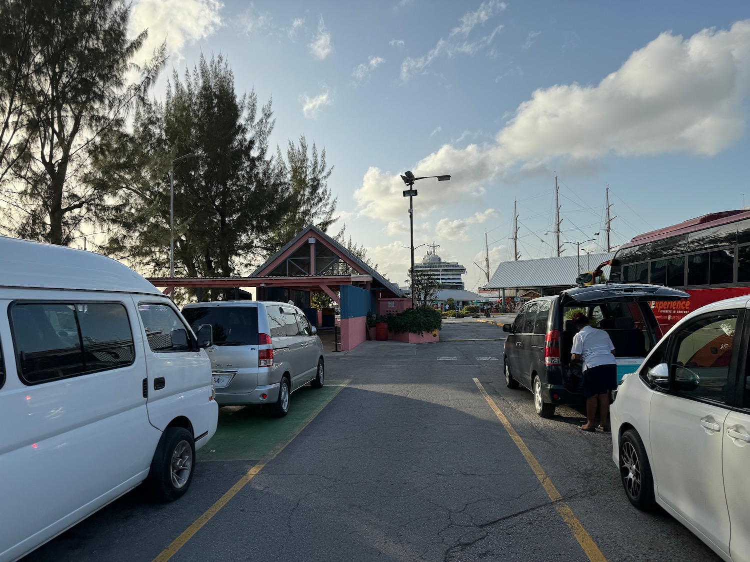 a group of cars parked in a parking lot