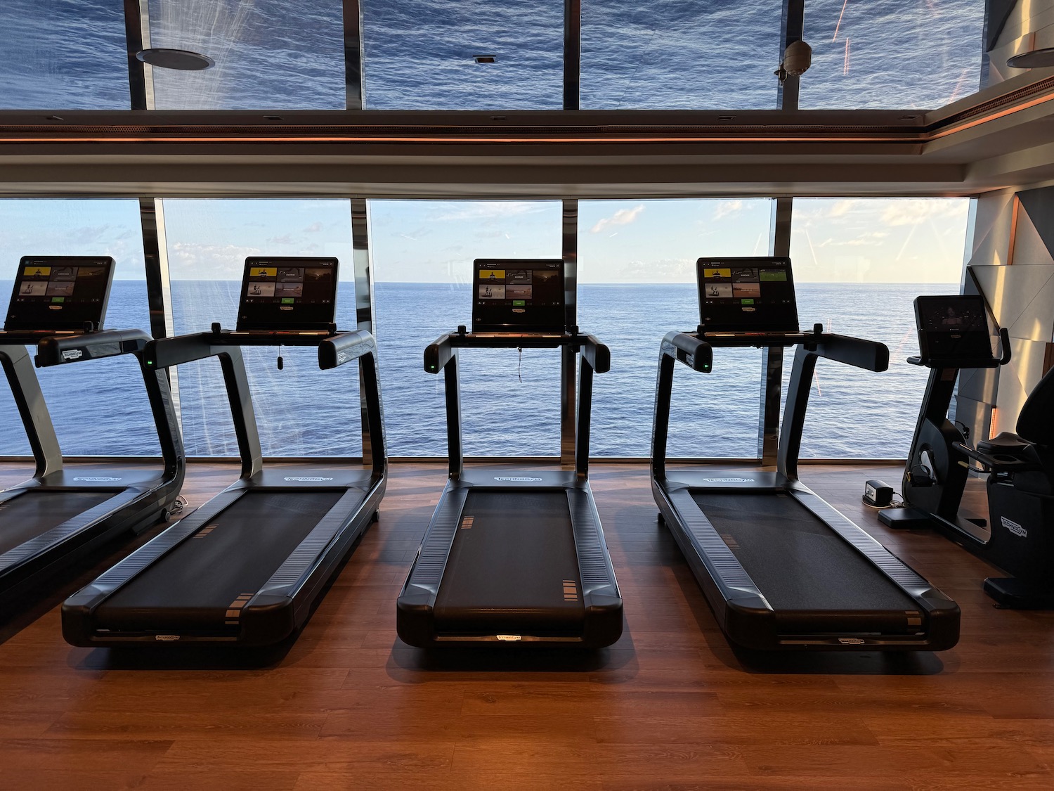 tread treadmills in a room with a view of the ocean