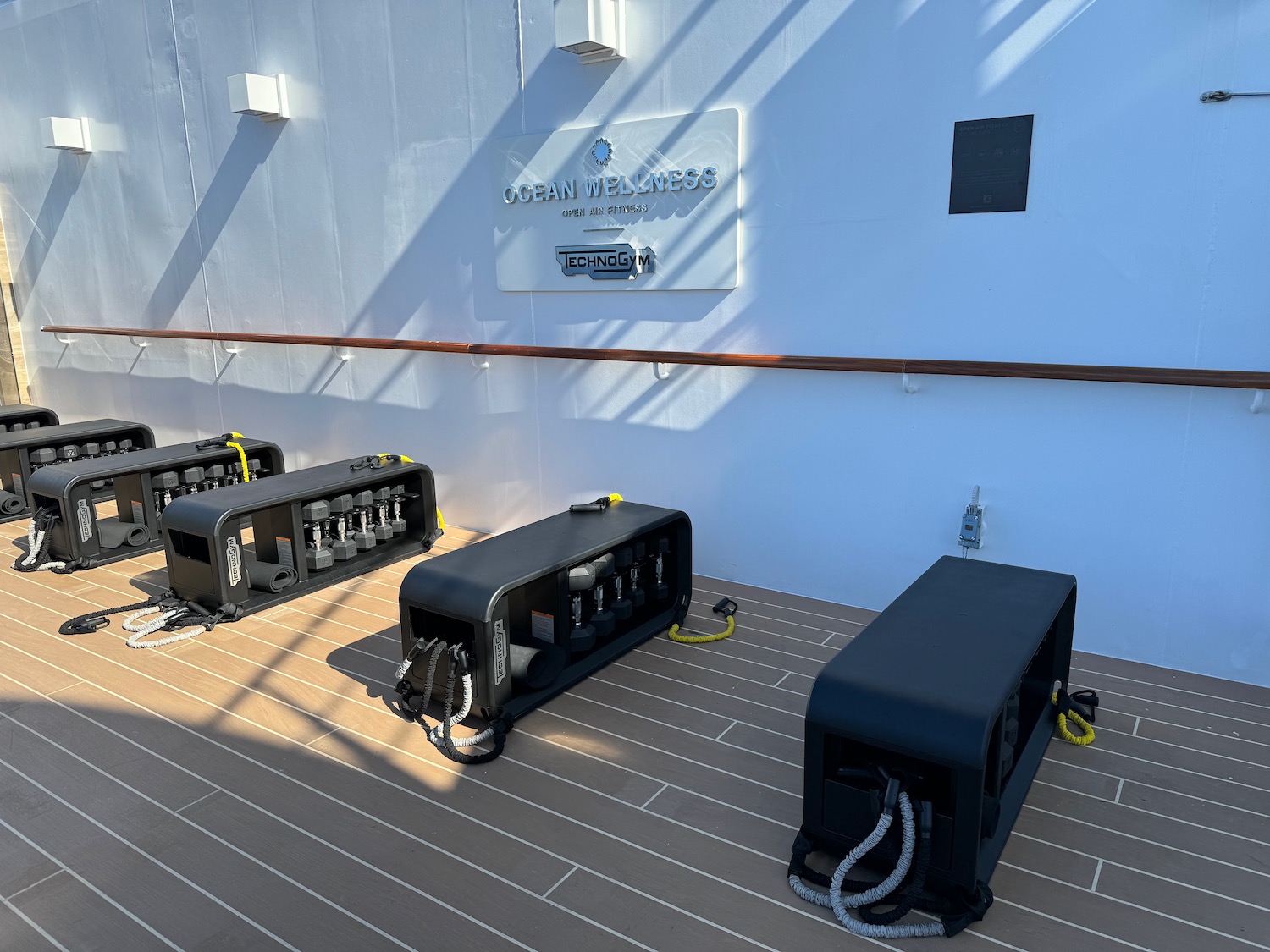 several black boxes on a deck