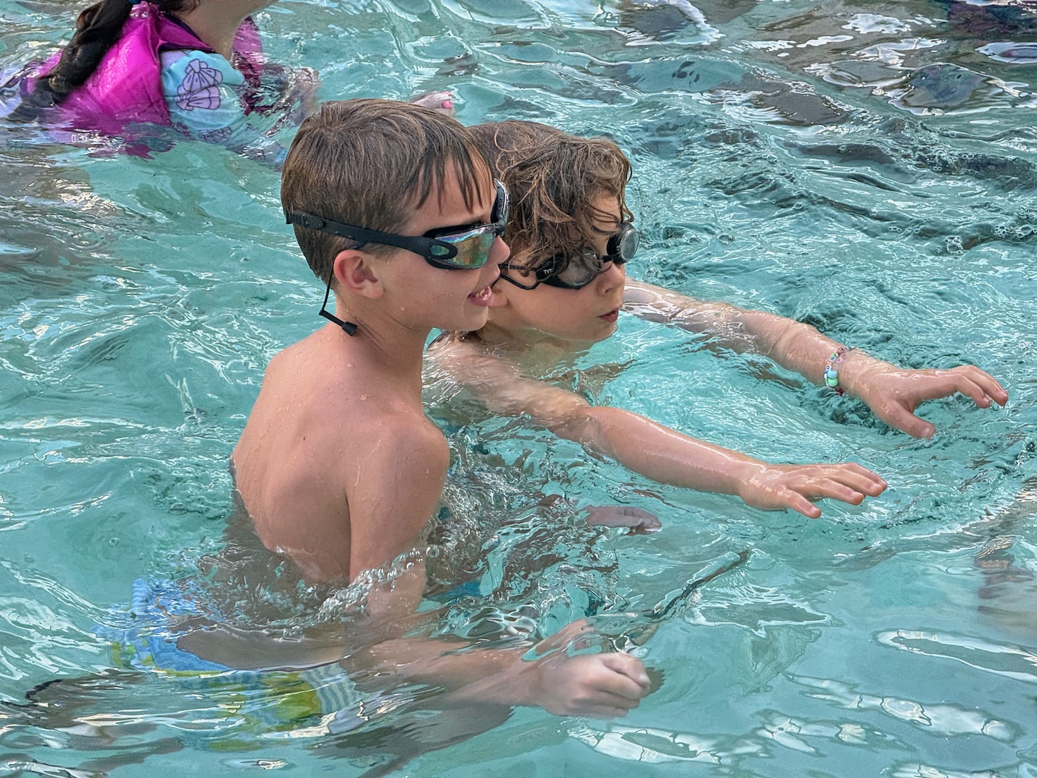 two children in a pool