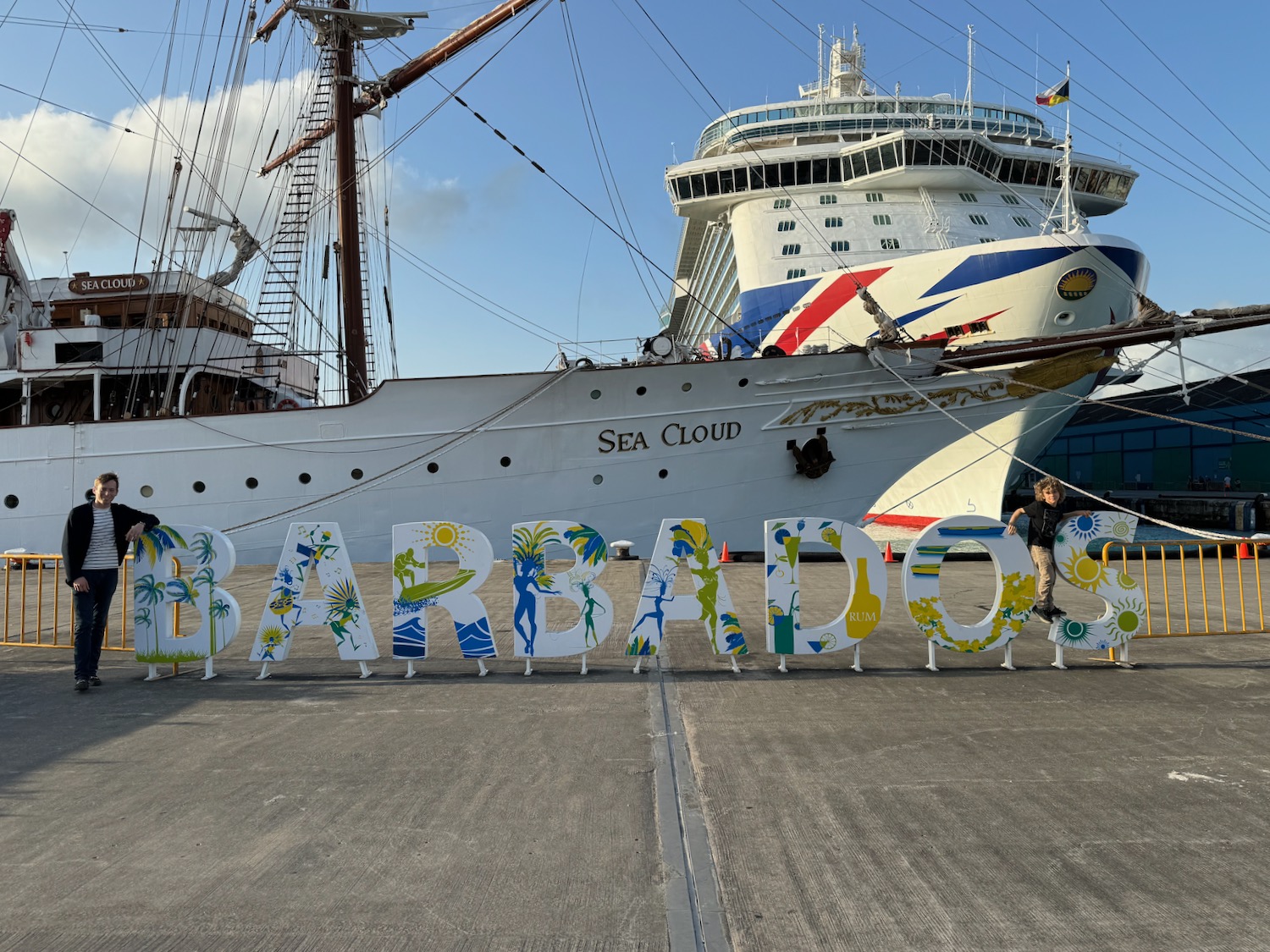 a large white boat with a large sign in front of it