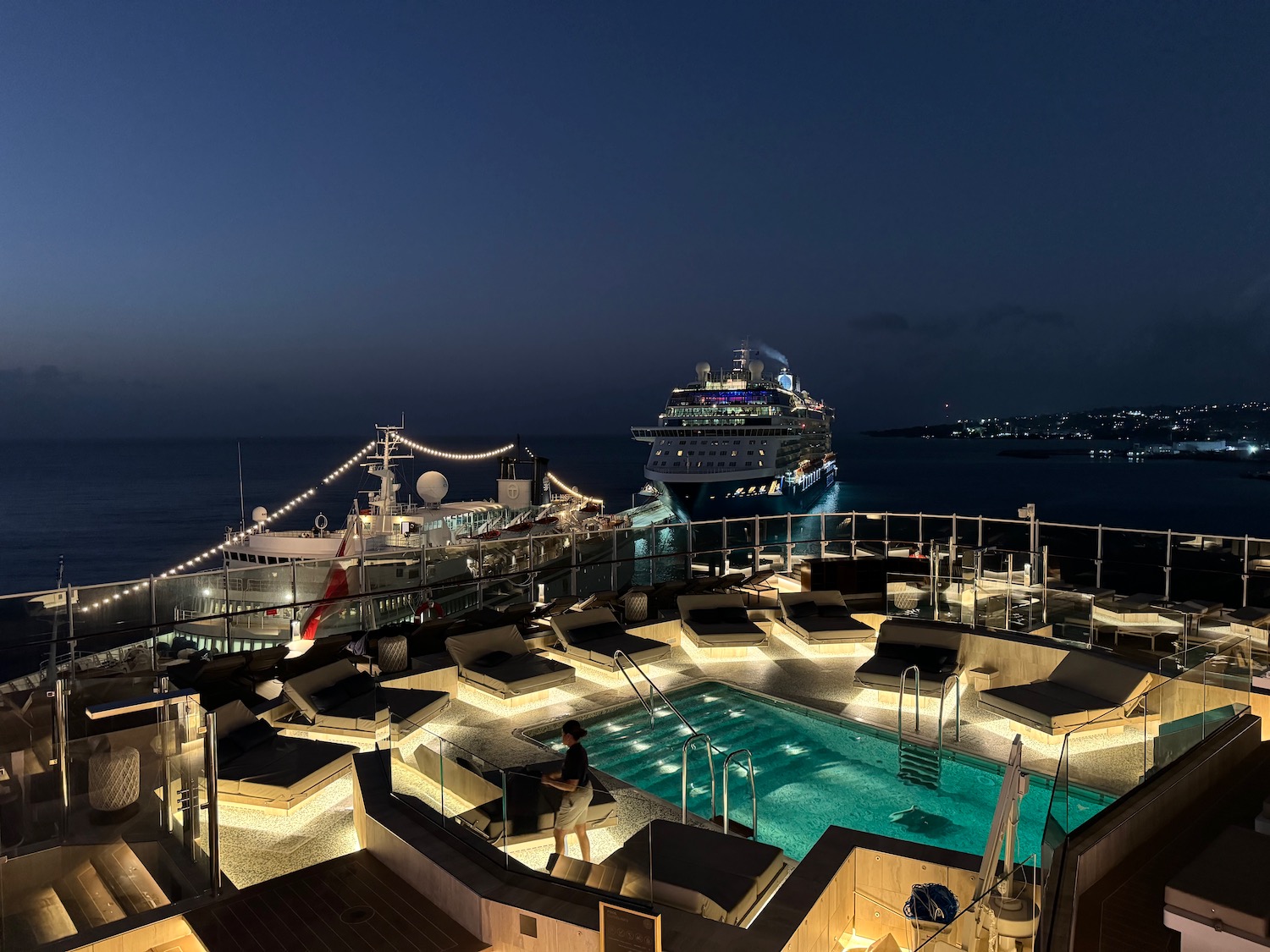 a cruise ship and a pool on a deck