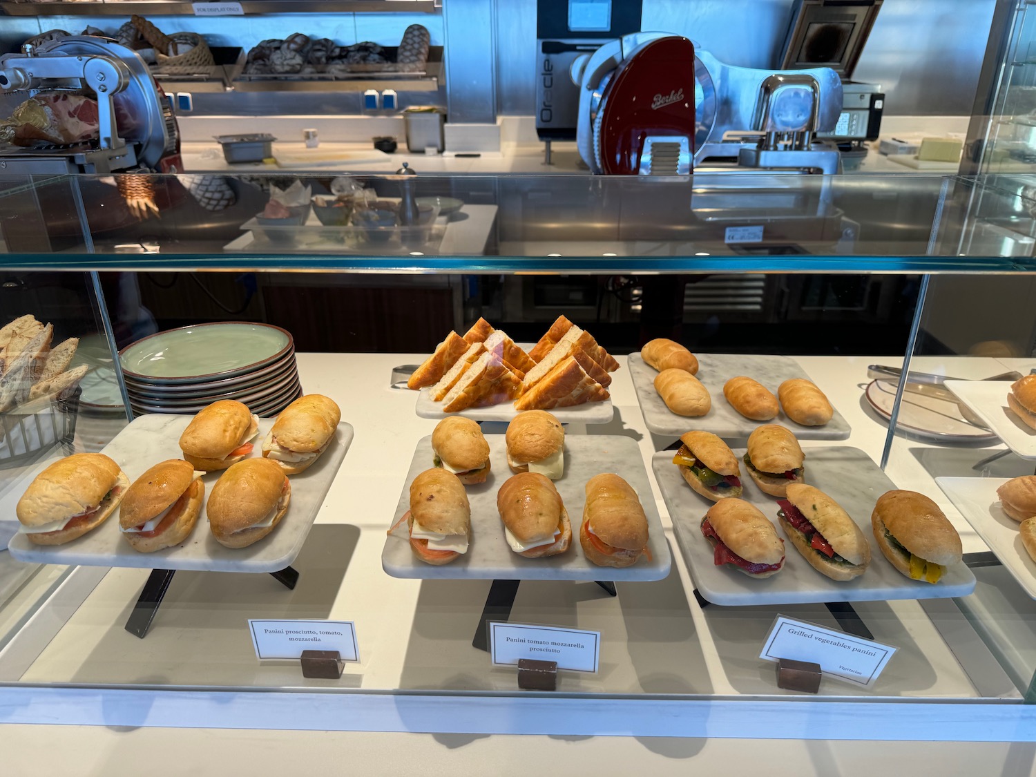 a display of sandwiches on plates