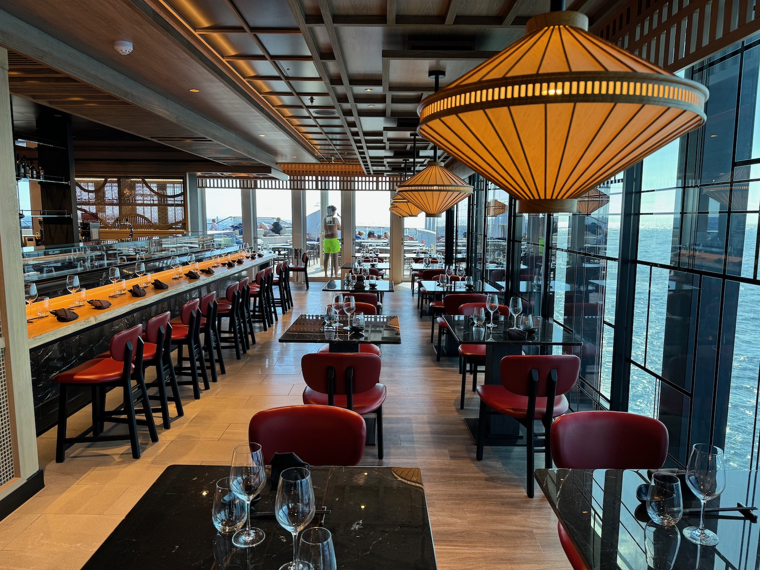 a restaurant with tables and chairs