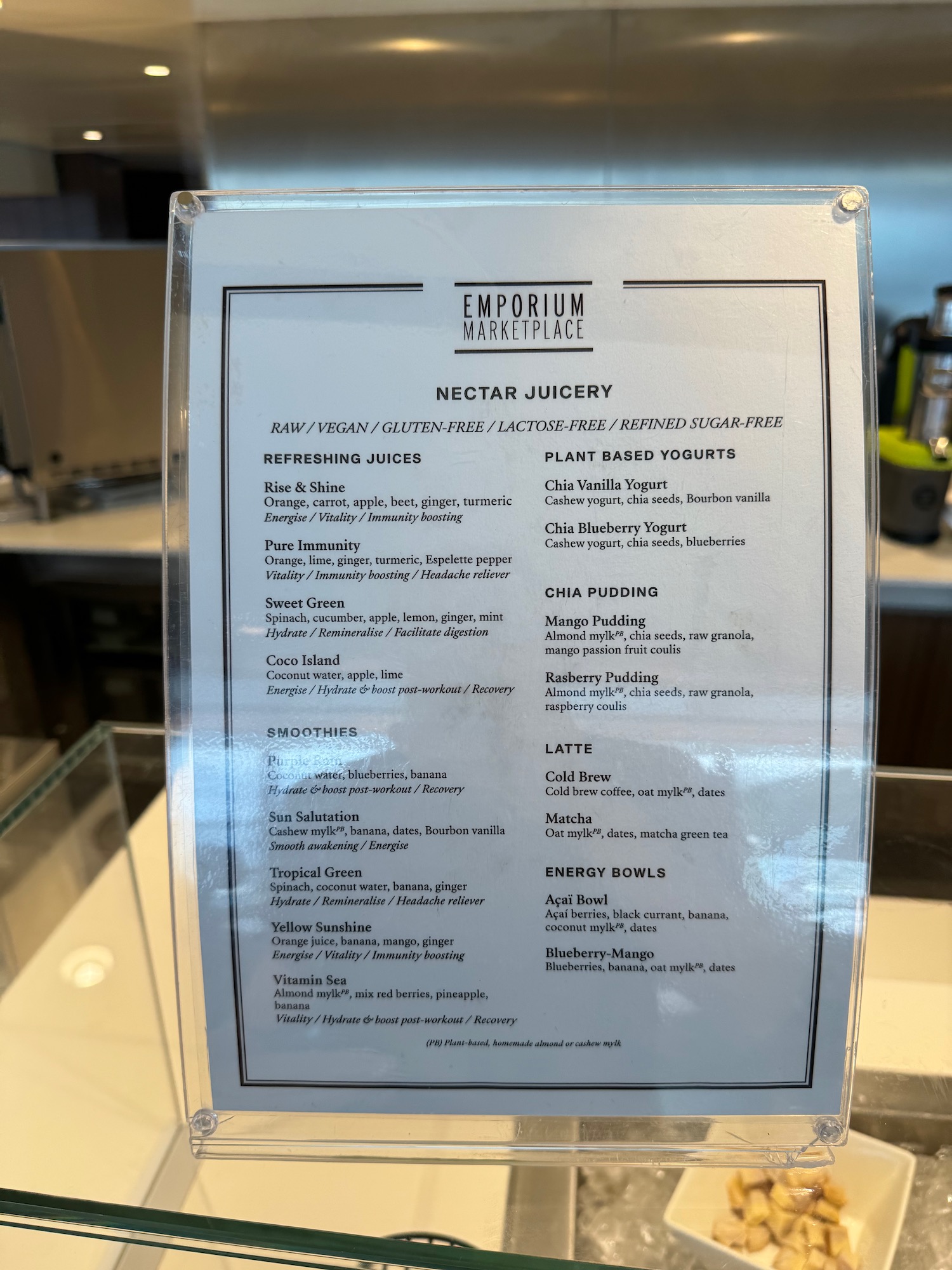 a menu on a glass shelf