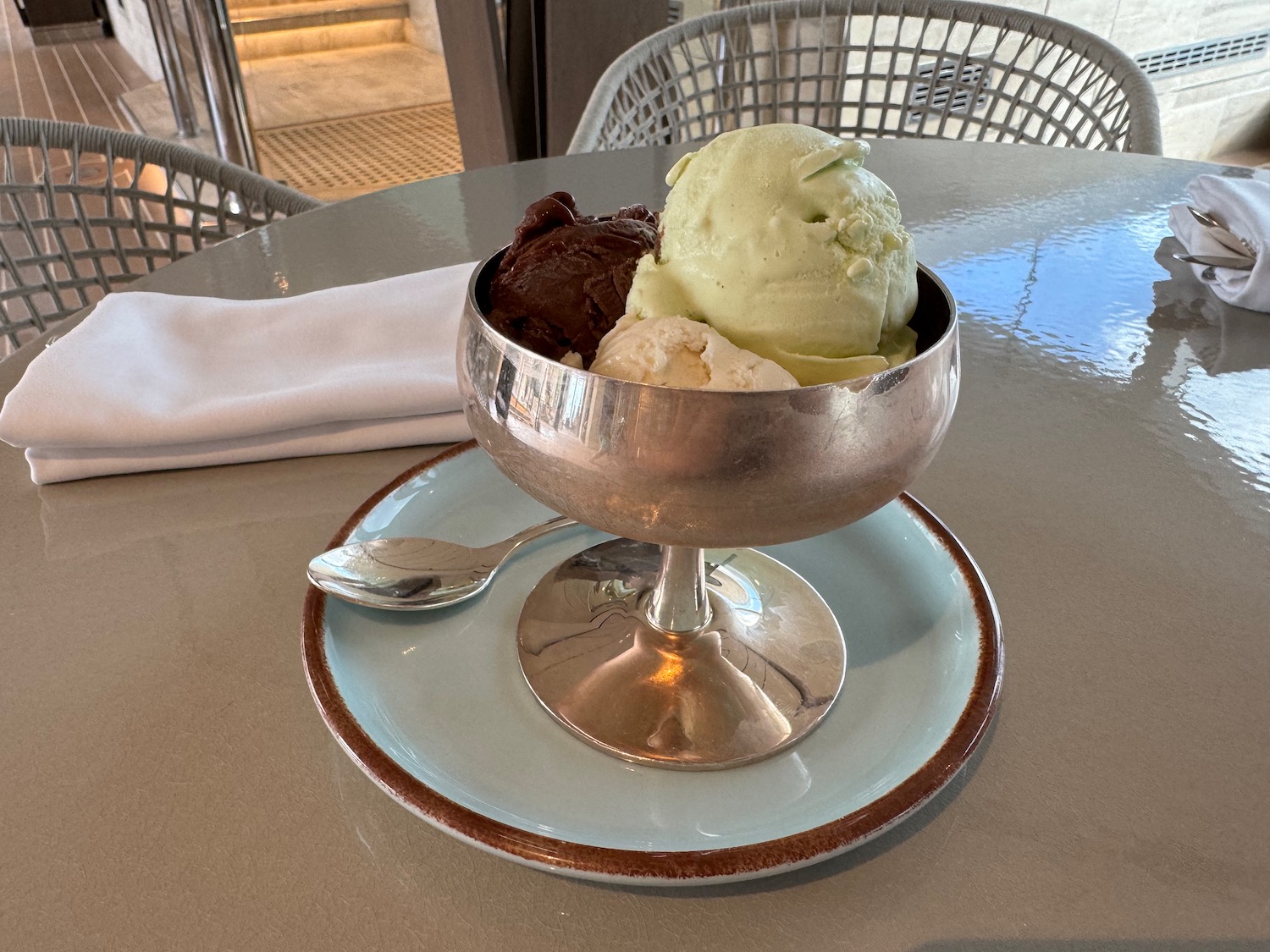 a bowl of ice cream on a plate