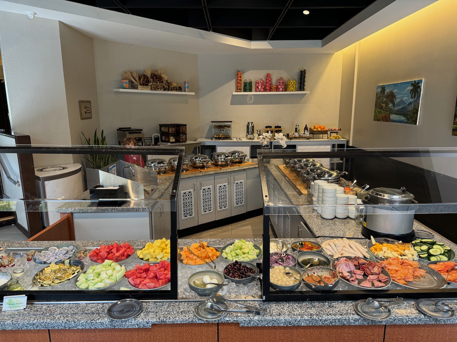 a buffet with different food items in it