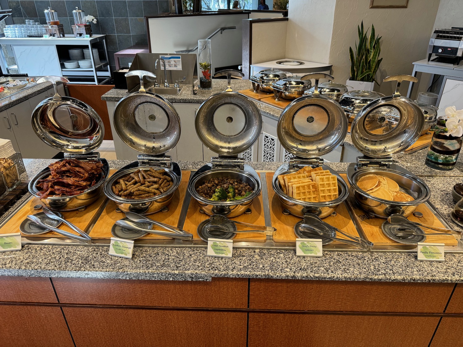 a buffet with food in bowls