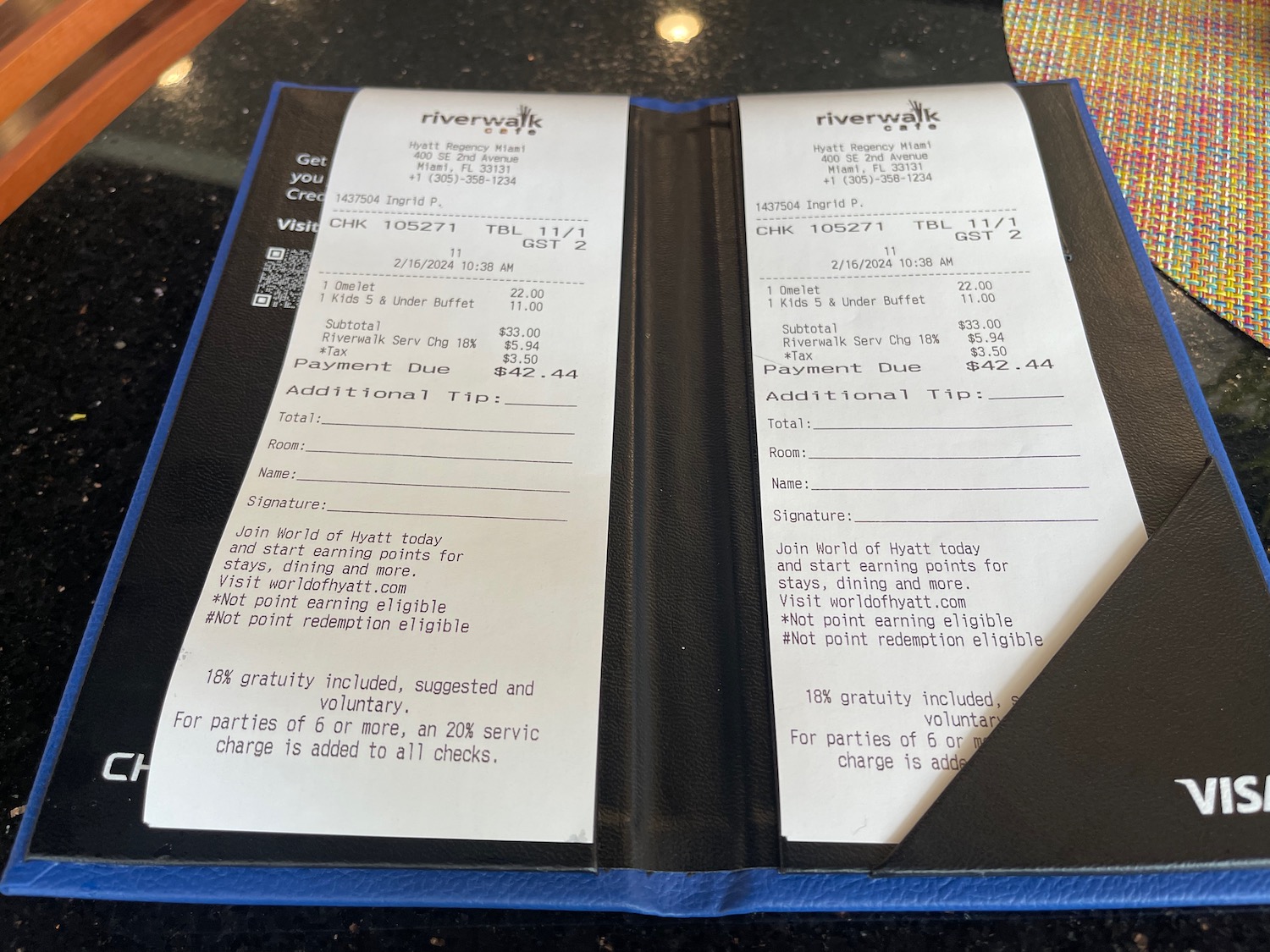 a restaurant bill open with receipt