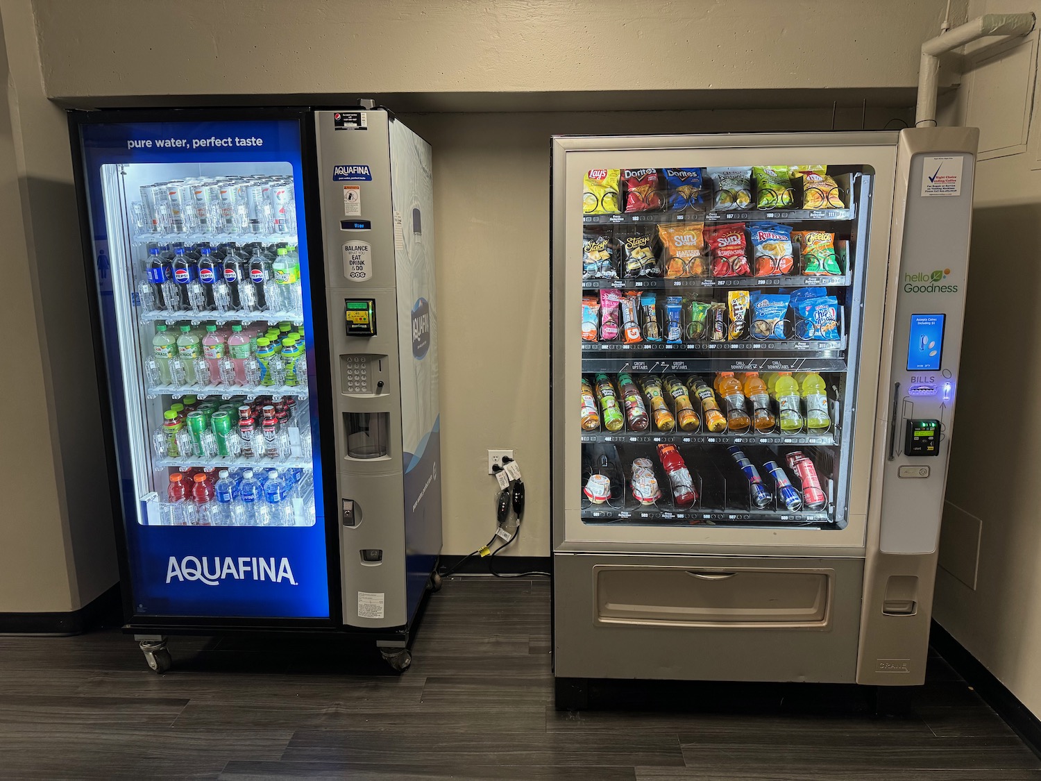 a vending machine with drinks and snacks