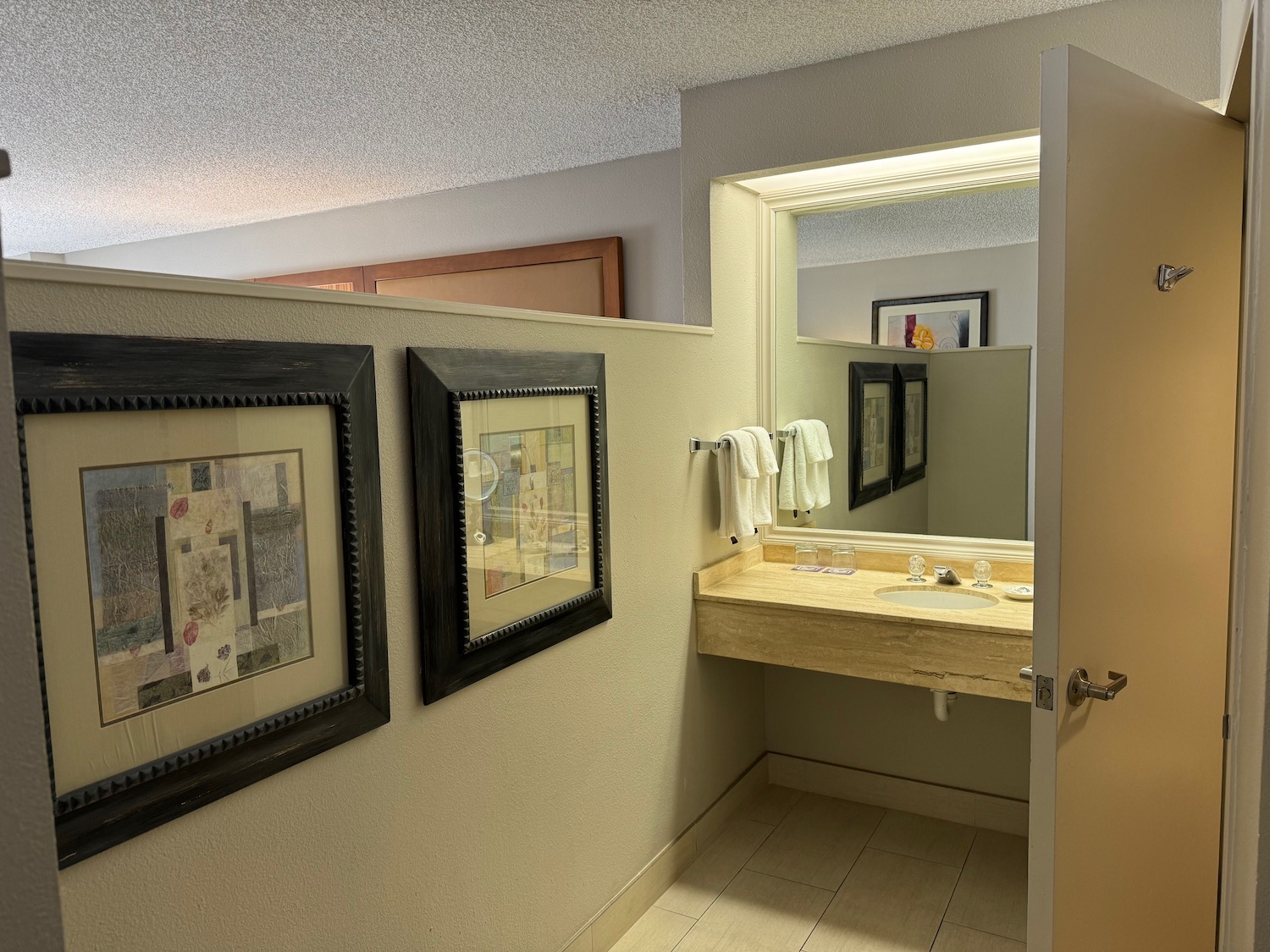 a bathroom with a sink and mirror