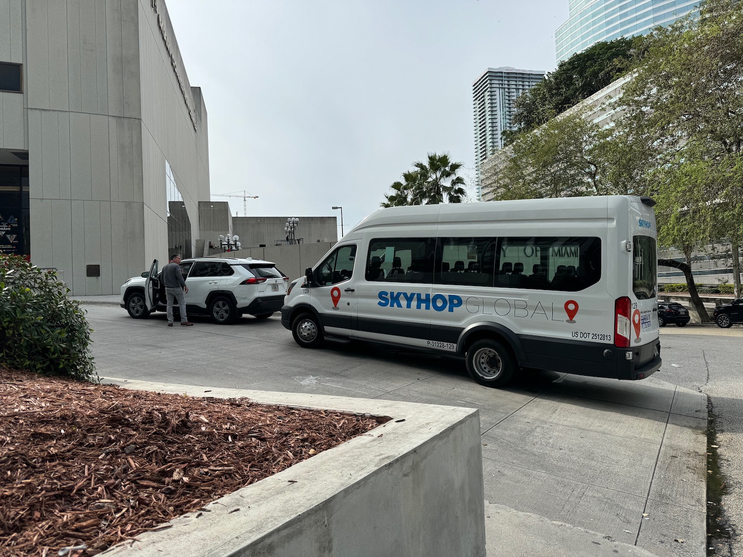 a white van parked on the side of a road