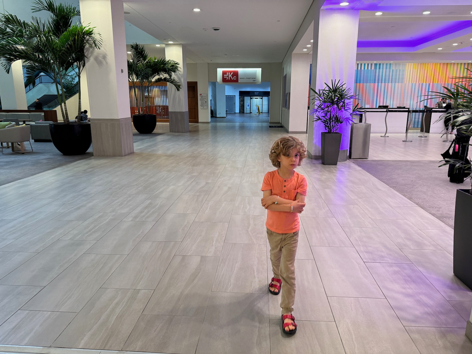 a child standing in a large room