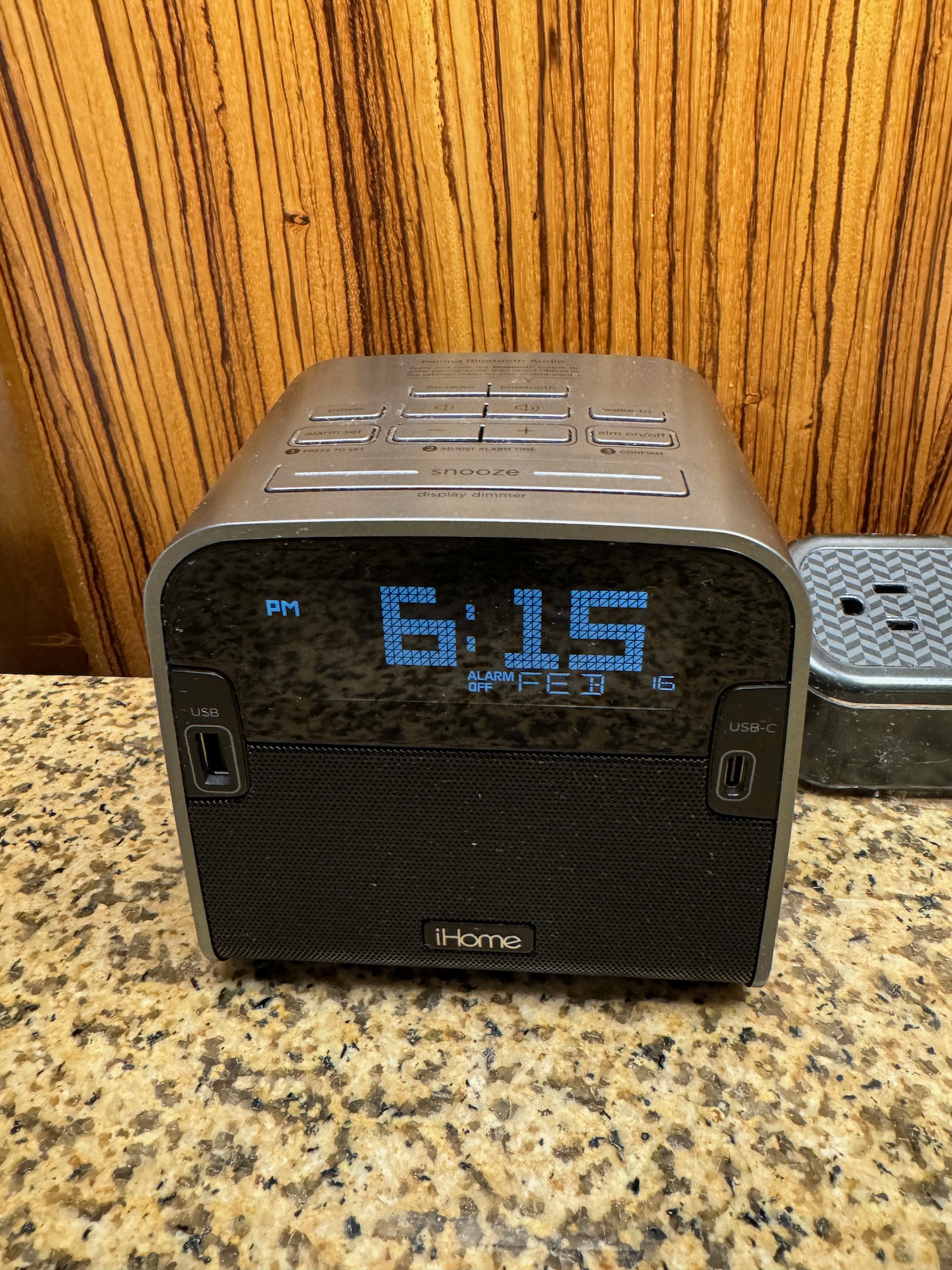 a digital clock on a counter