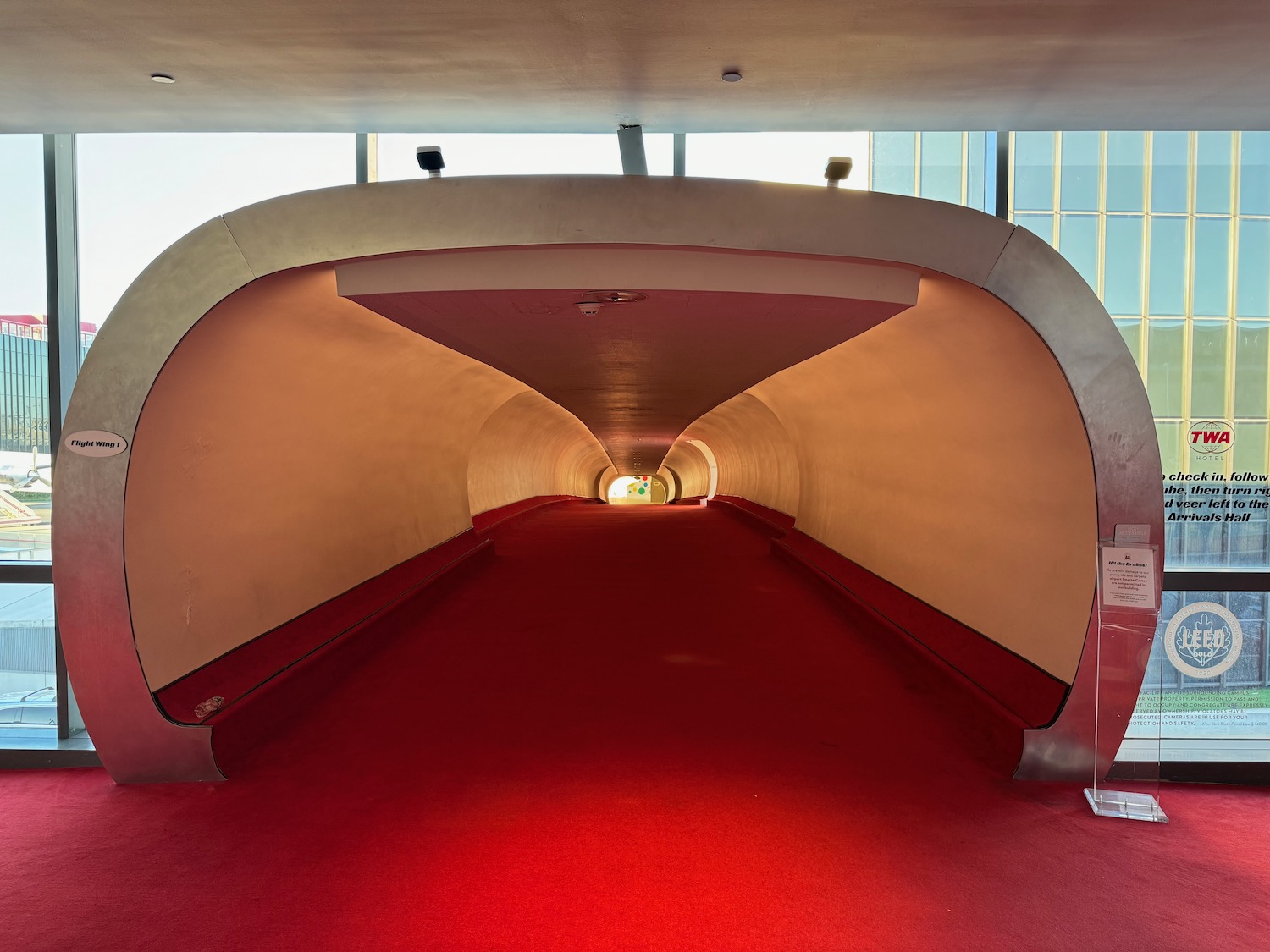 a tunnel with red carpet