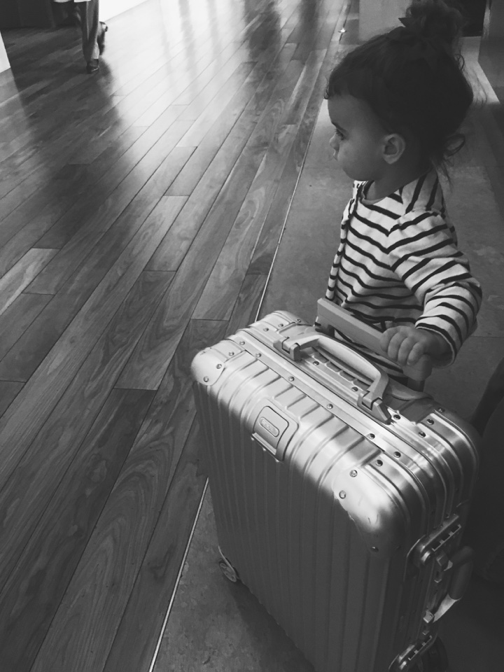 Is Rimowa worth it - child with suitcase