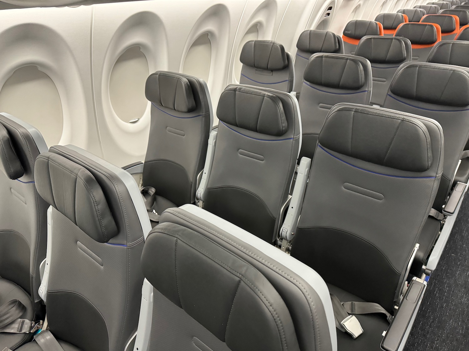 a row of seats on an airplane