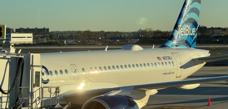 a jet plane on the tarmac
