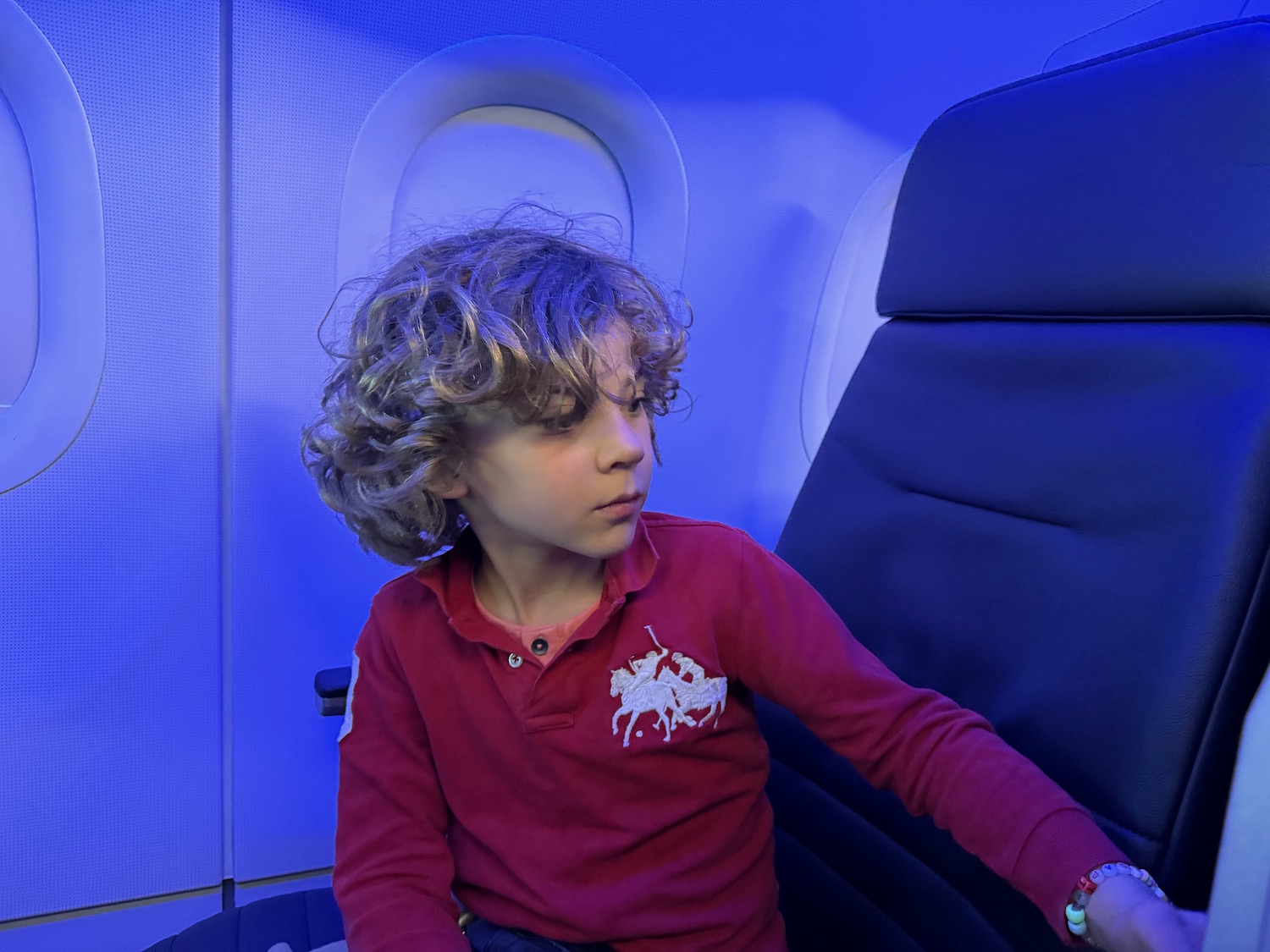 a child sitting in a plane