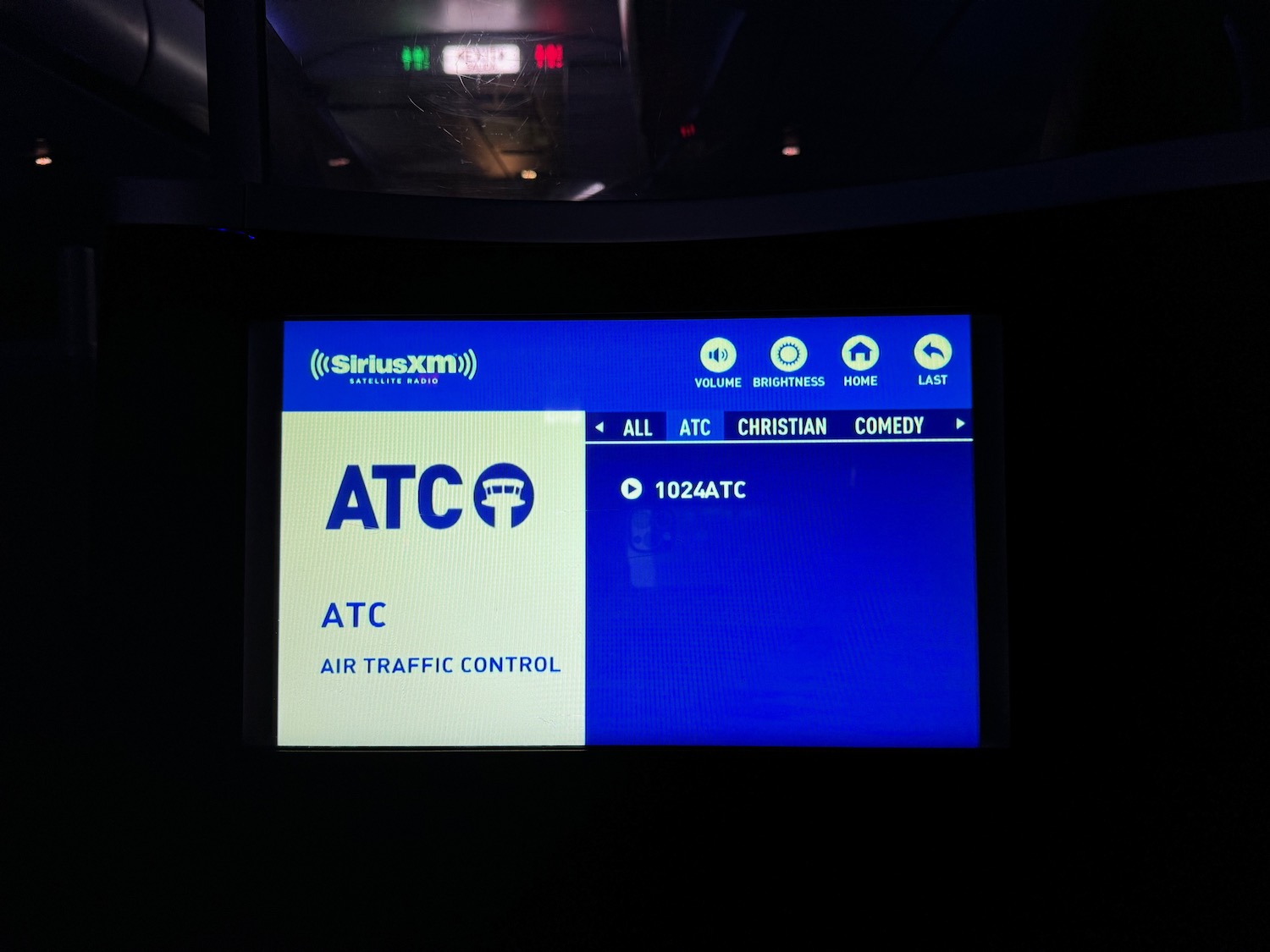 a screen with a blue and white sign