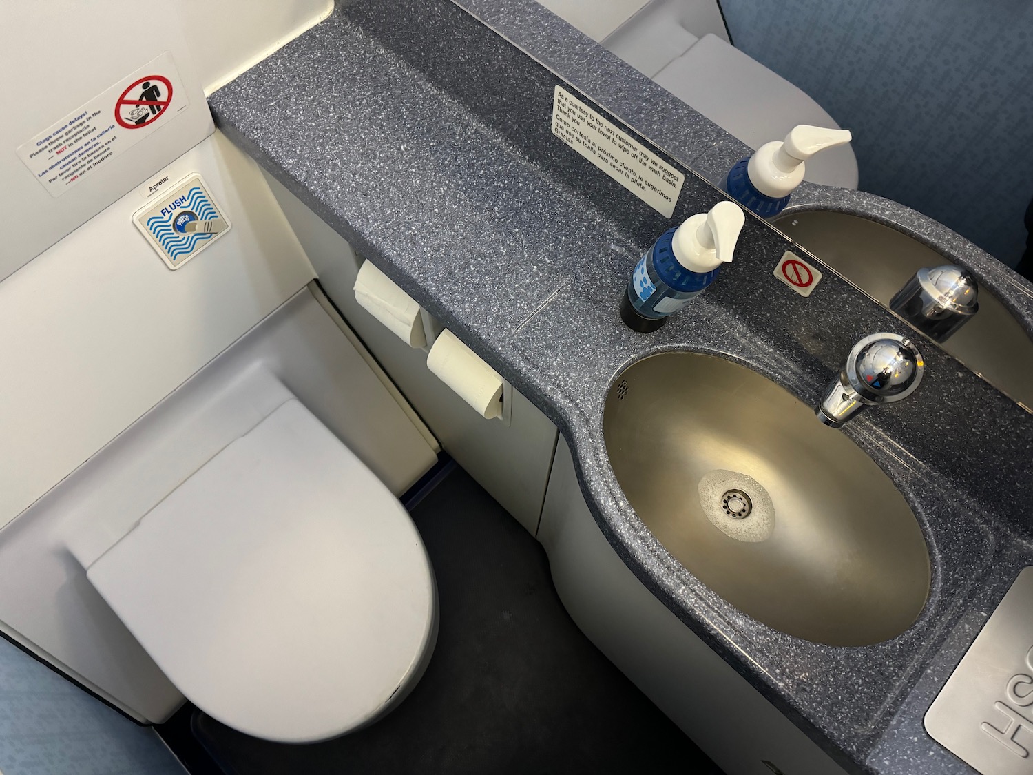 a sink and toilet in a bathroom