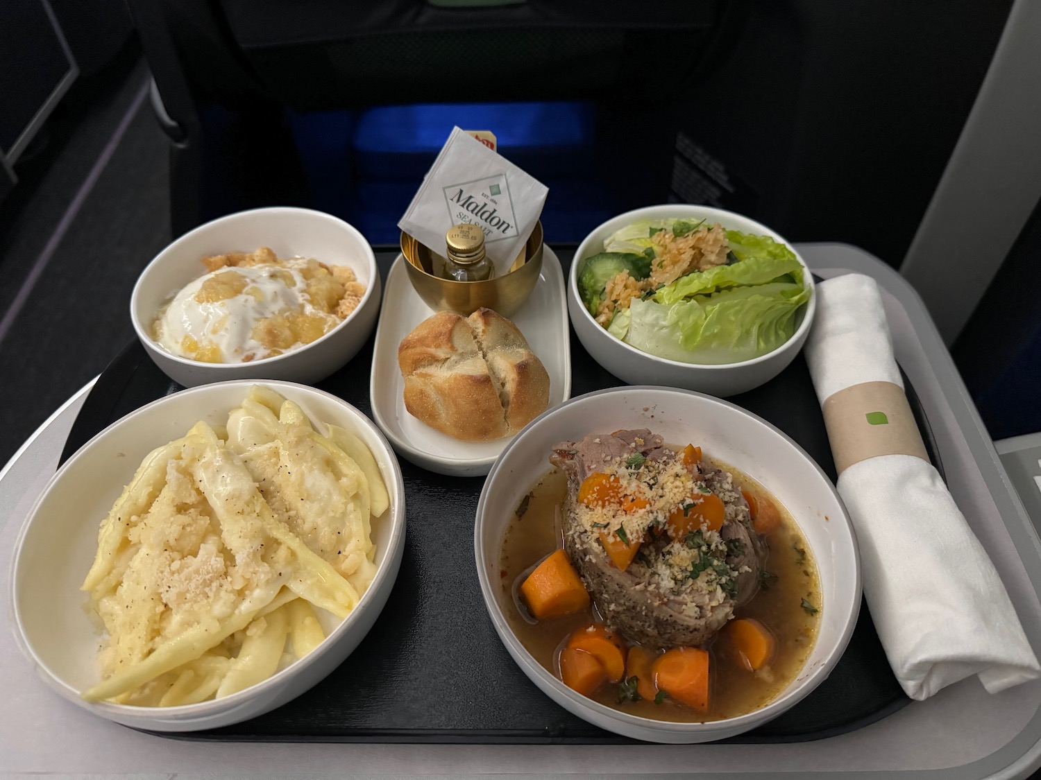 a tray of food on a plane