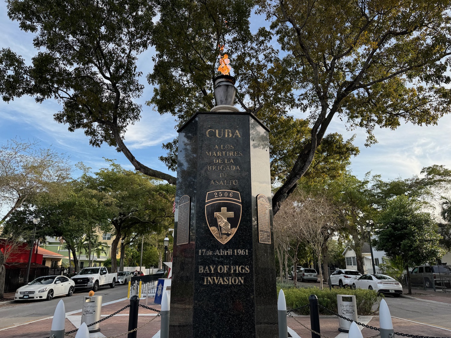 a monument with a torch on top