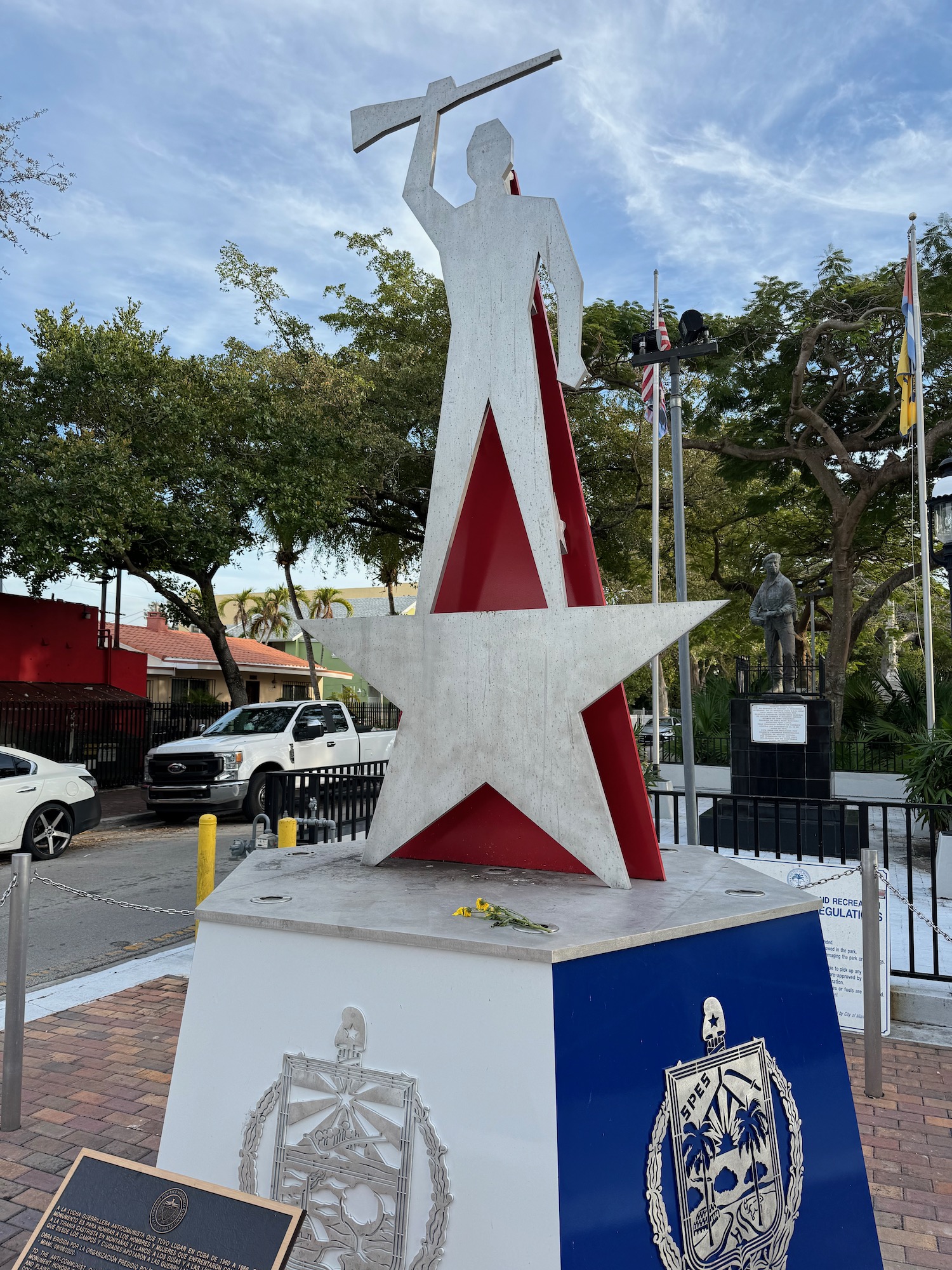 a statue of a man holding a star