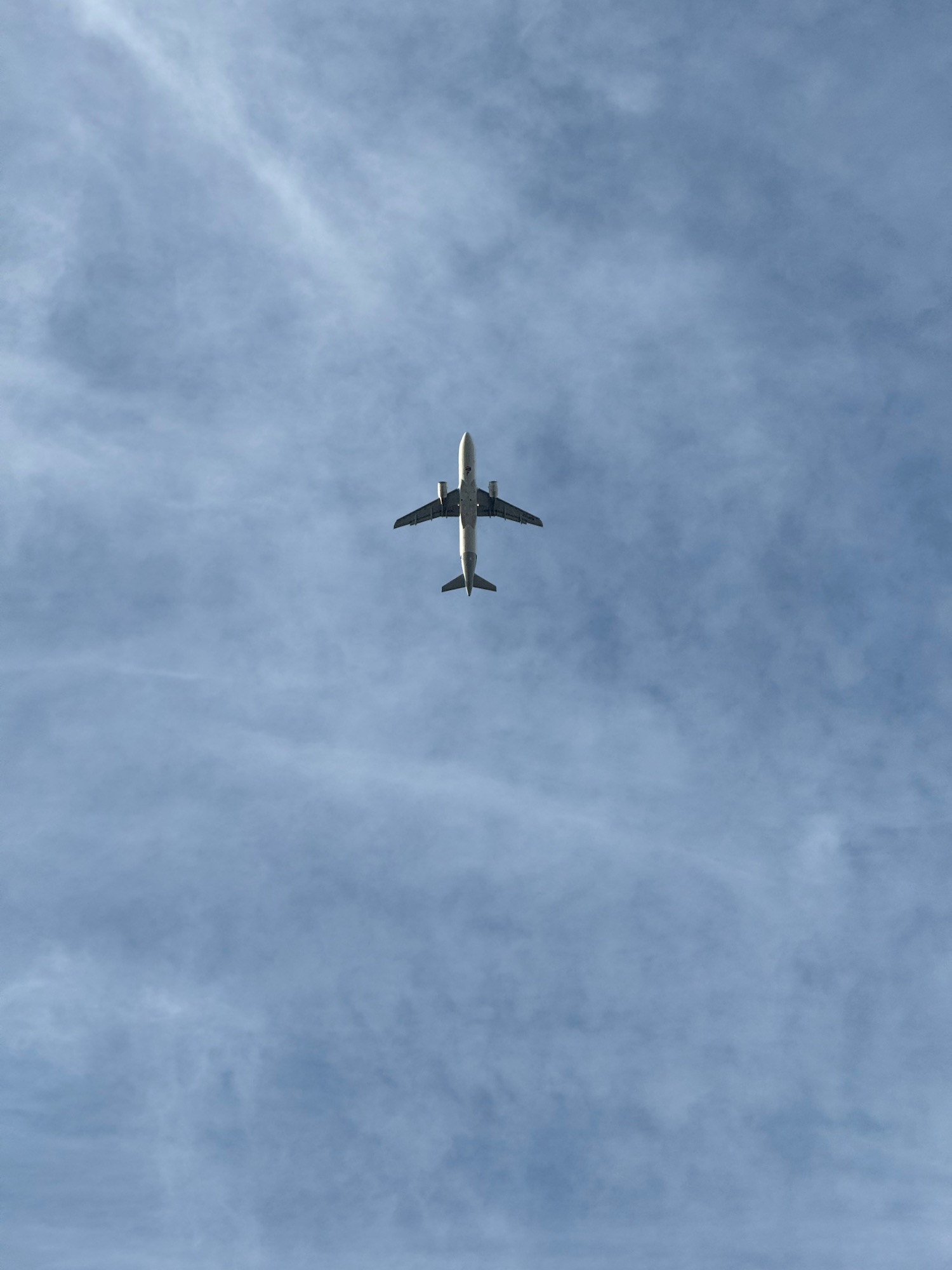 an airplane flying in the sky