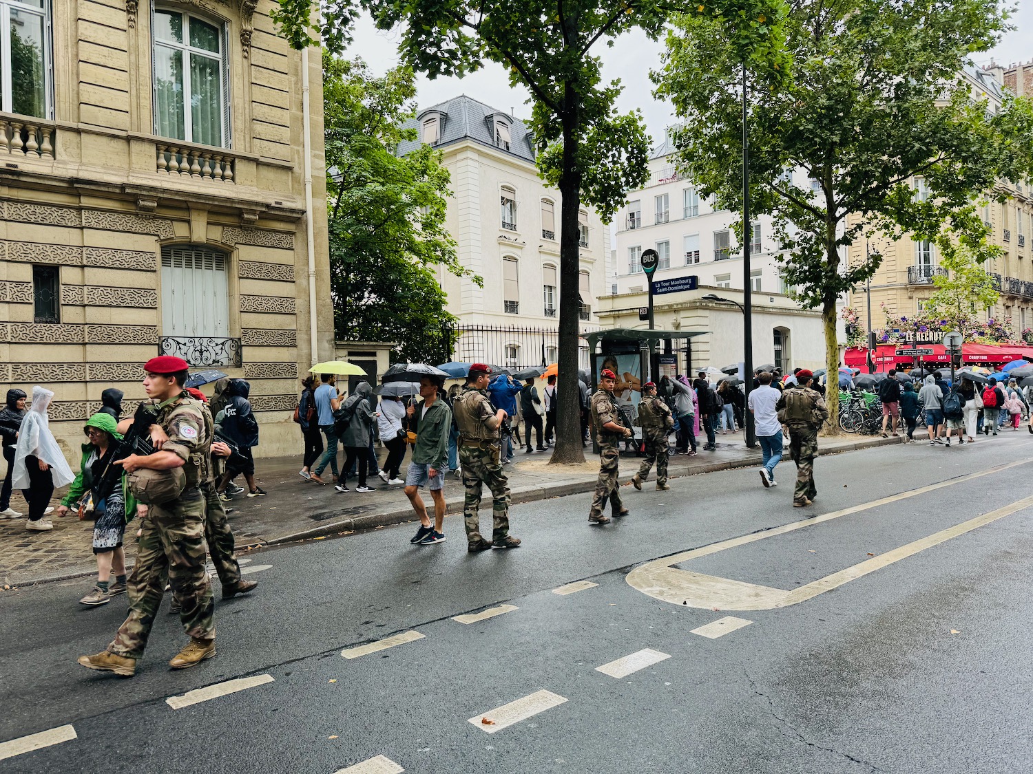 a group of people walking on a street