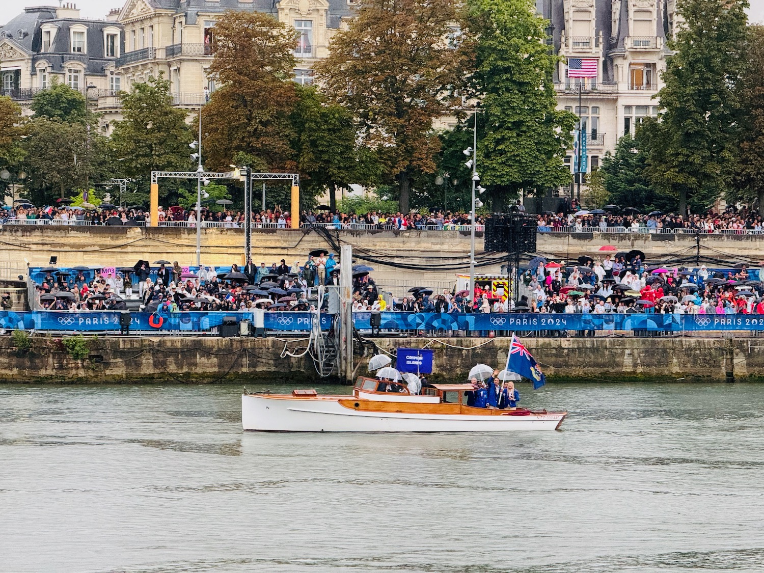 a boat on the water with people in the background