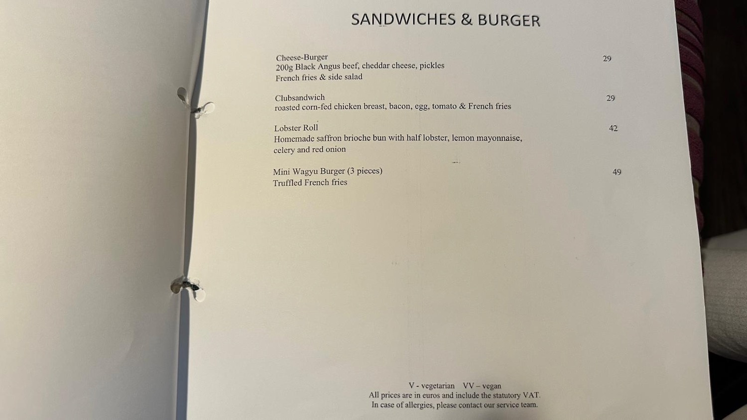 a menu with black text and white text