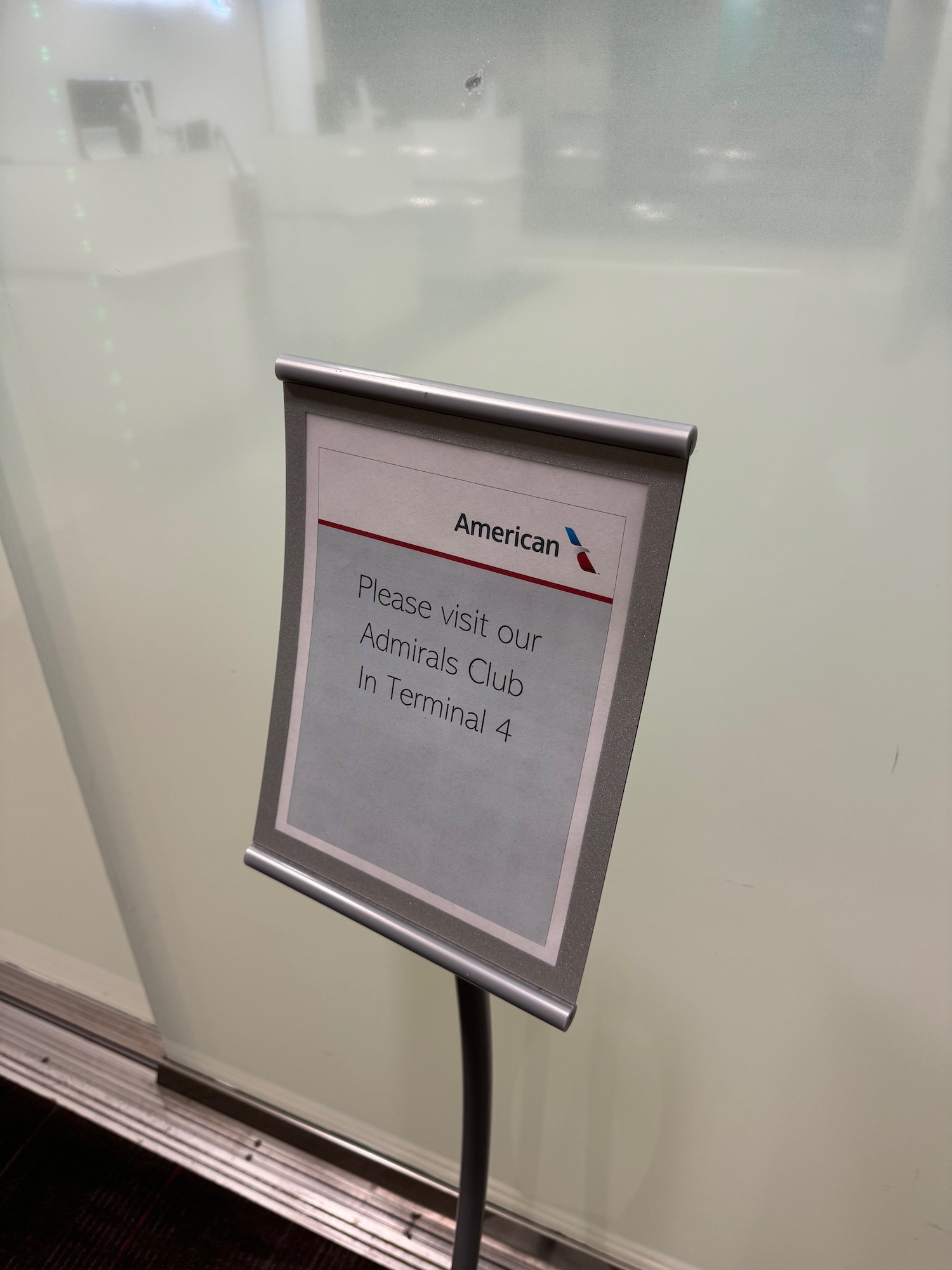 a sign on a glass wall