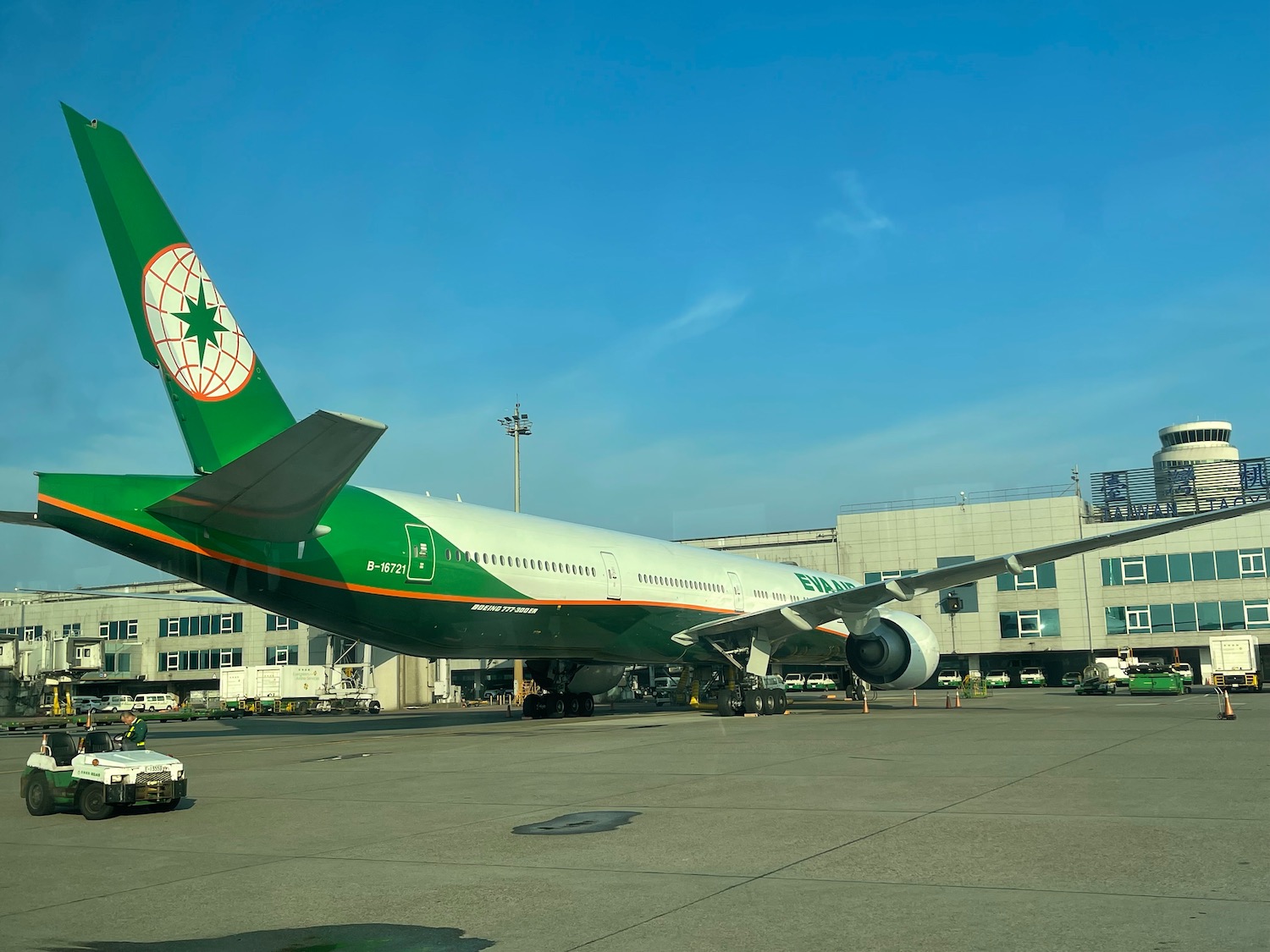 a large aircraft parked on a runway