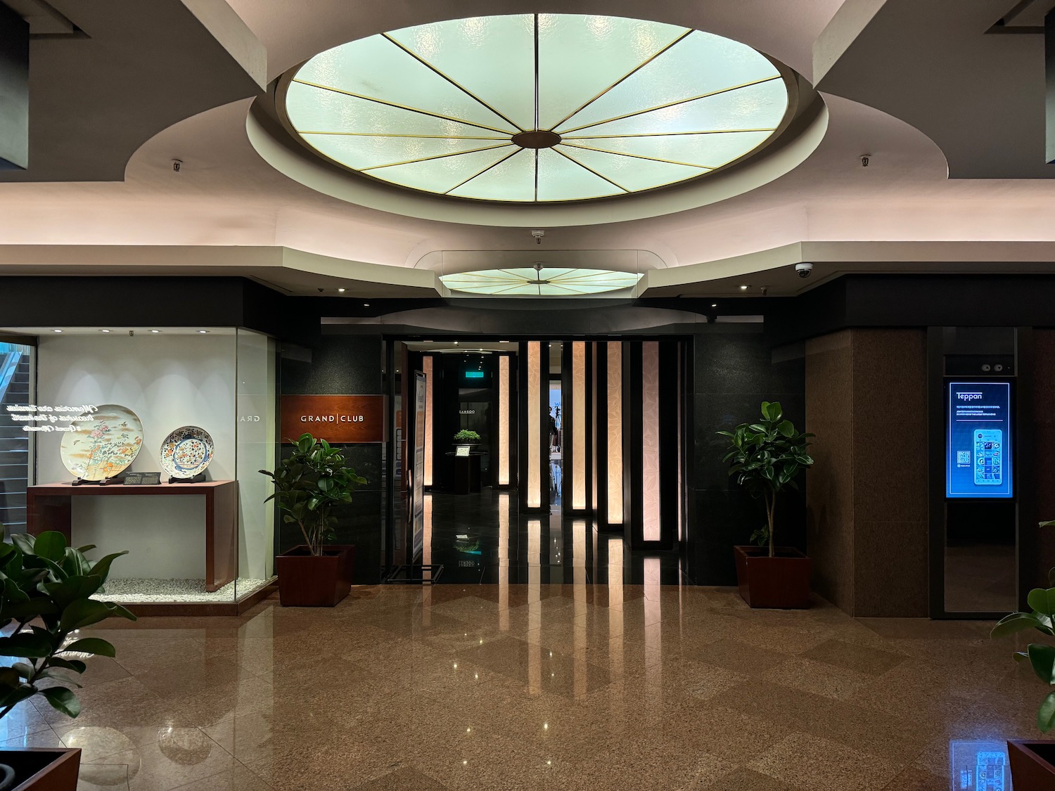 a large circular ceiling light in a building