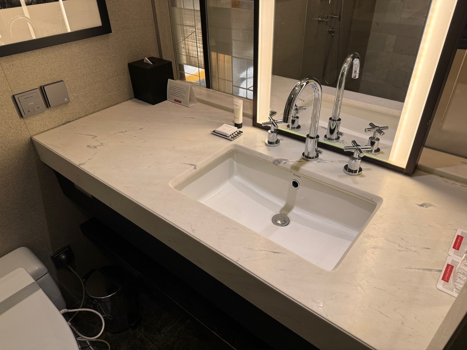 a bathroom sink with a mirror